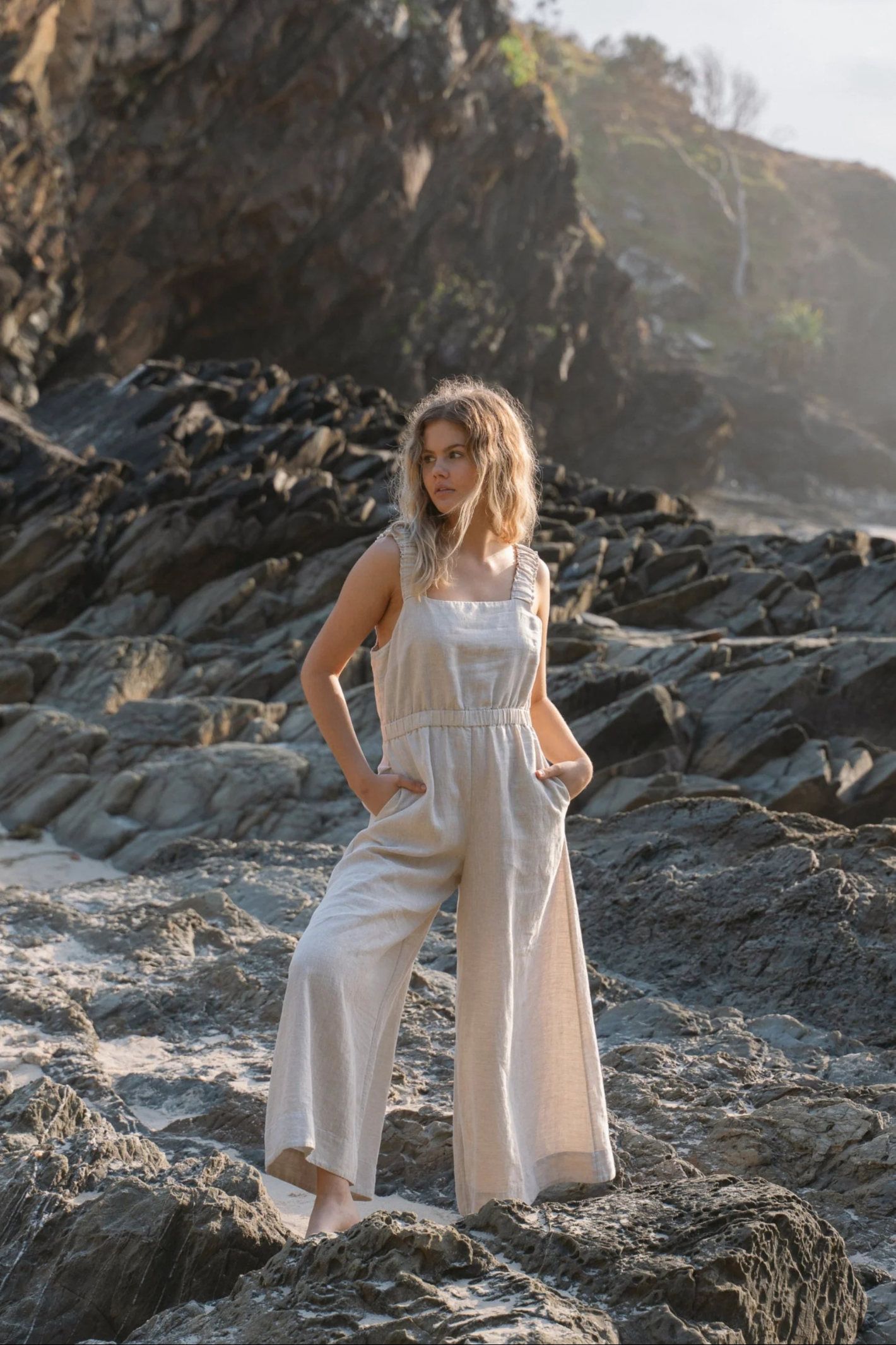 Lilly Pilly LPS23-D004 Keely Linen Jumpsuit Oatmeal by Lilly Pilly modeled outdoors, shop Lilly Pilly at Dotique.