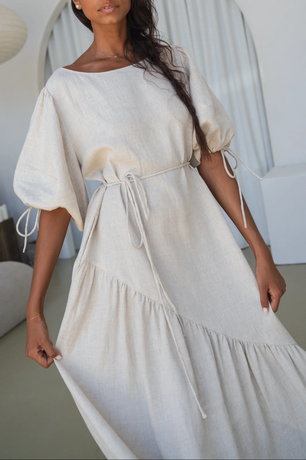 Woman wearing Lilly Pilly LPSS22-D002 Charlotte Linen Dress Oatmeal by Lilly Pilly, shop Lilly Pilly at Dotique.