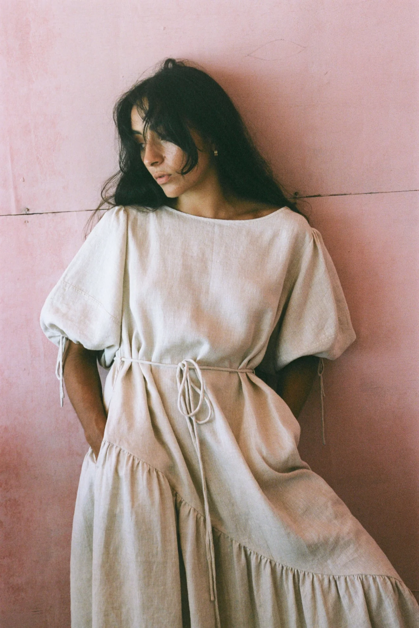 Model wearing Lilly Pilly LPSS22-D002 Charlotte Linen Dress Oatmeal by Lilly Pilly, shop Lilly Pilly at Dotique.