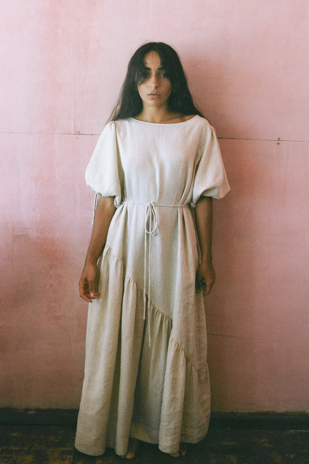 Woman wearing Lilly Pilly LPSS22-D002 Charlotte Linen Dress Oatmeal by Lilly Pilly, shop Lilly Pilly at Dotique.