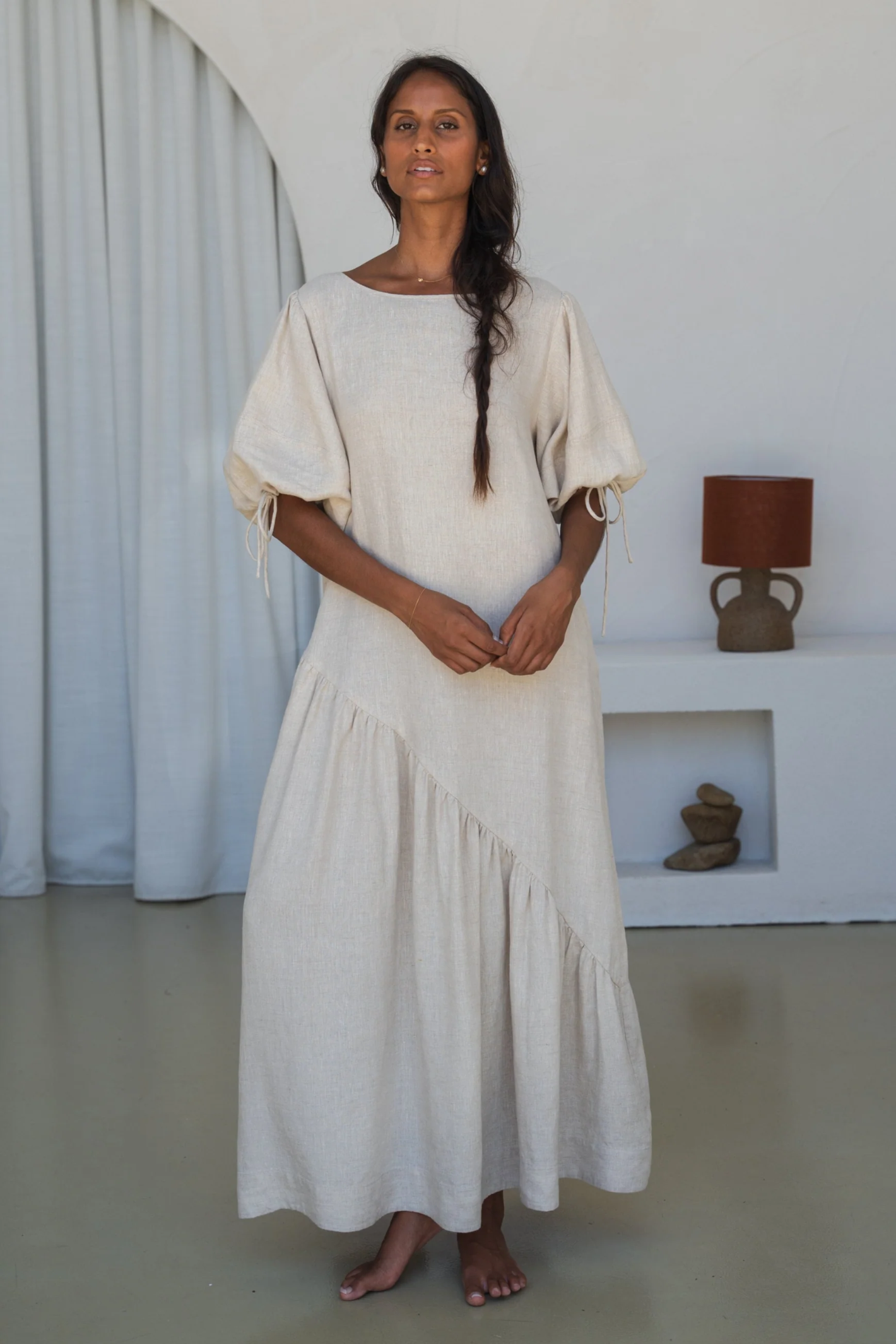 Woman wearing Lilly Pilly LPSS22-D002 Charlotte Linen Dress Oatmeal by Lilly Pilly Shop Lilly Pilly at Dotique