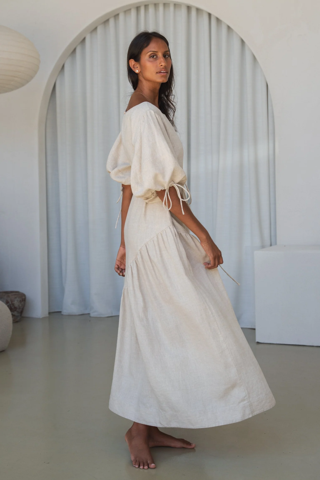 Model wearing Lilly Pilly LPSS22-D002 Charlotte Linen Dress Oatmeal by Lilly Pilly, shop Lilly Pilly at Dotique.