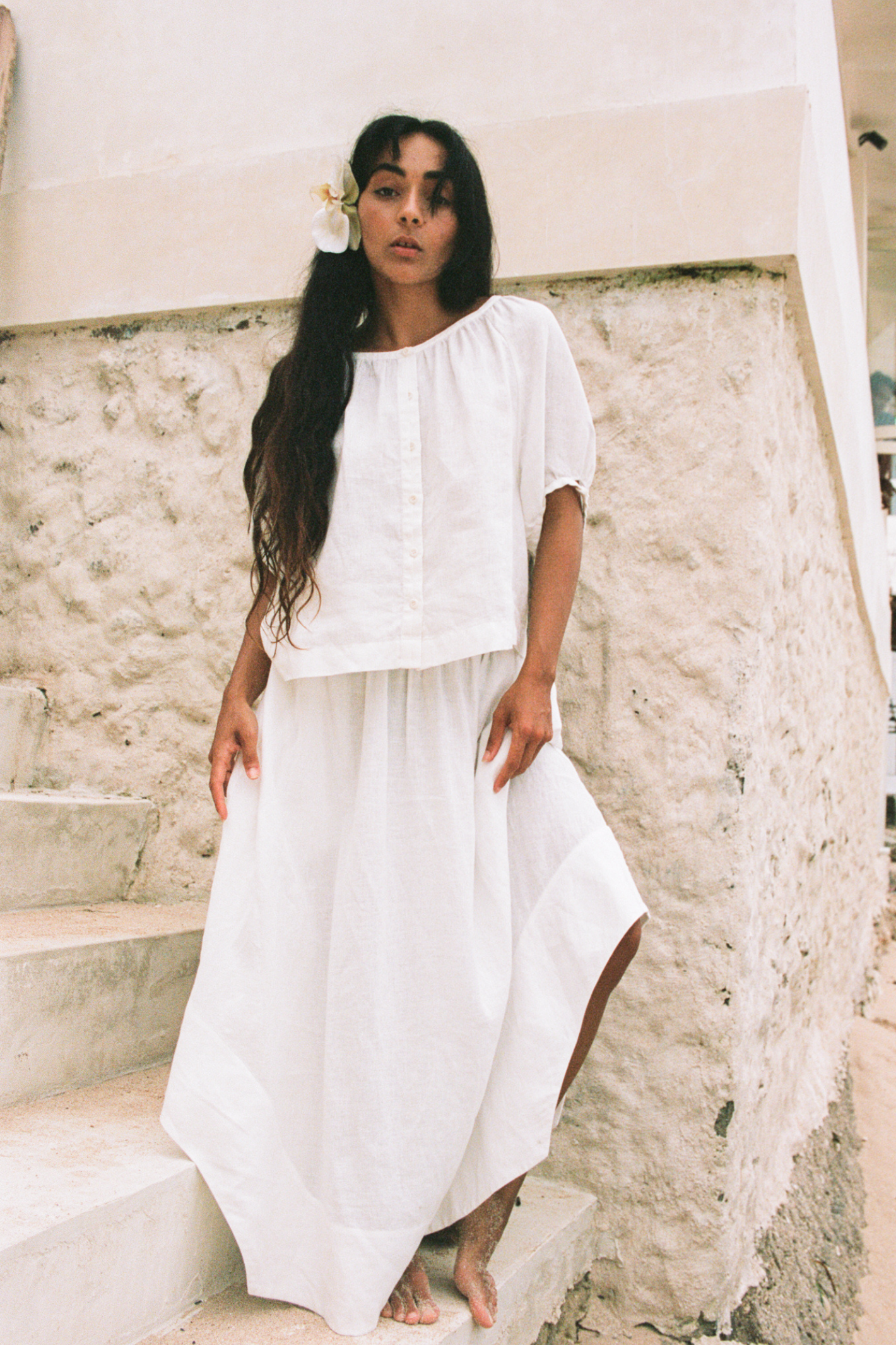 Model wearing Lilly Pilly LP-T008 Pia Linen Top Ivory by Lilly Pilly, shop the vendor at Dotique for elegant linen styles