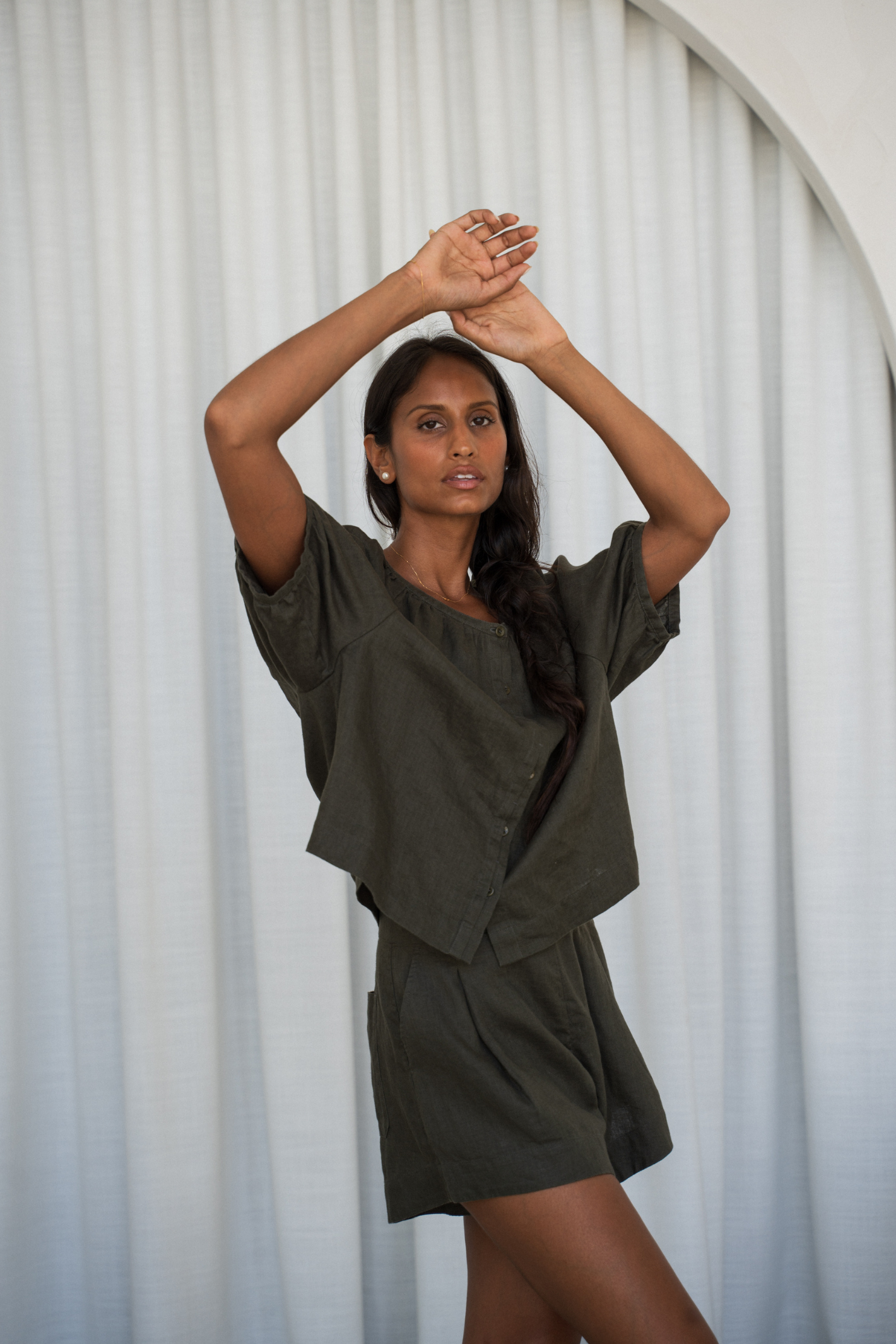 Model wearing Lilly Pilly LP-T008 Pia Linen Top Khaki by Lilly Pilly, shop the brand now at Dotique online store.