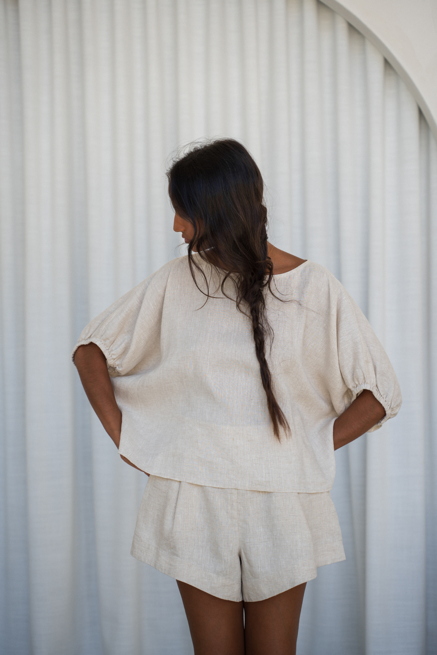 Model wears Lilly Pilly LPW23-T001 Tina Linen Top Oatmeal by Lilly Pilly, shop Lilly Pilly at Dotique.