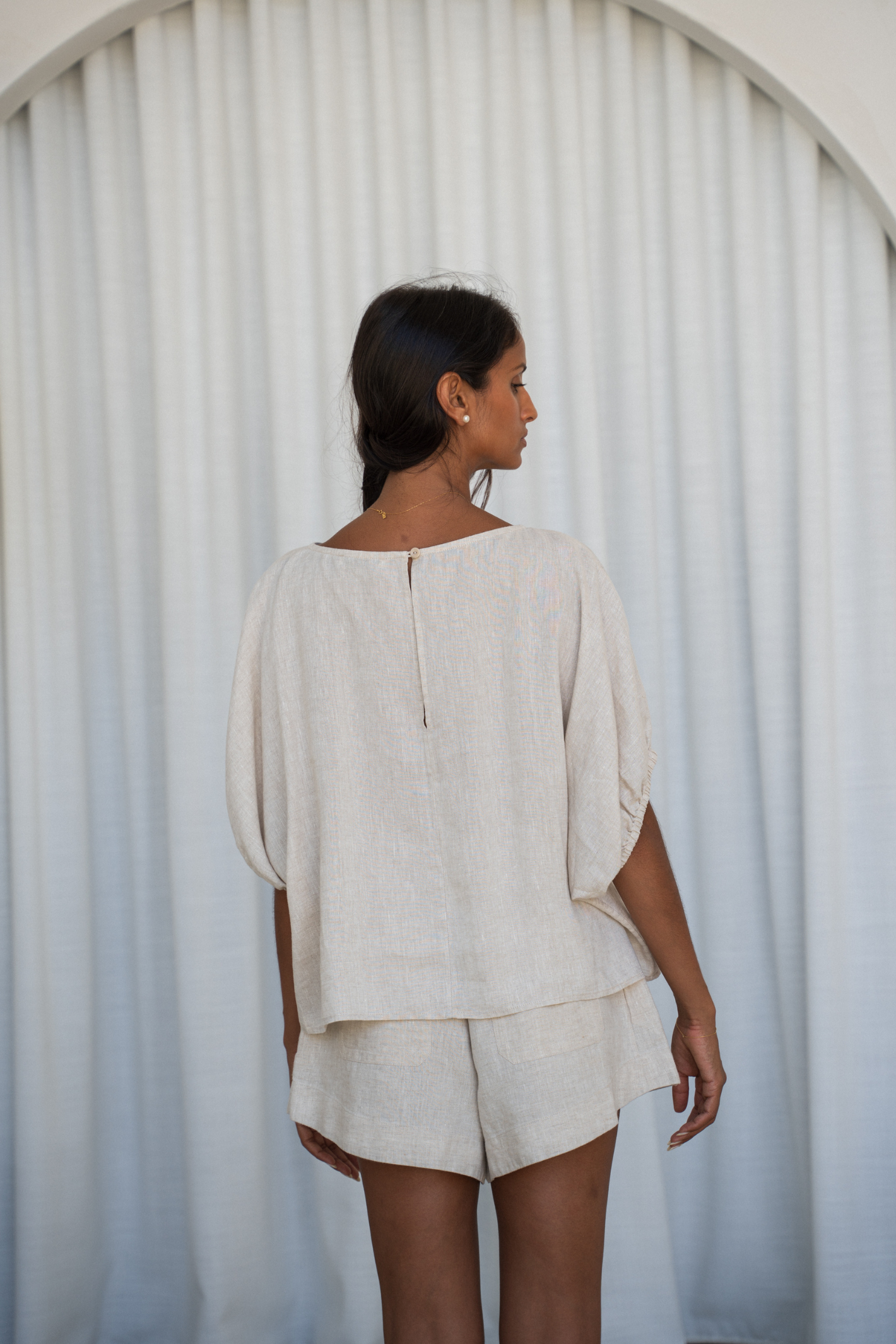 Lilly Pilly LPW23-T001 Tina Linen Top Oatmeal by Lilly Pilly shown on model, shop Lilly Pilly at Dotique online.