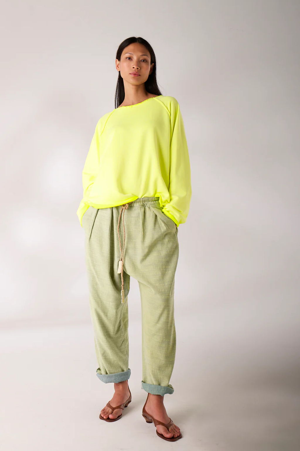Model wearing Liv Bergen Fine Sweater Tag Neon Yellow by liv bergen shop liv bergen at Dotique full body view