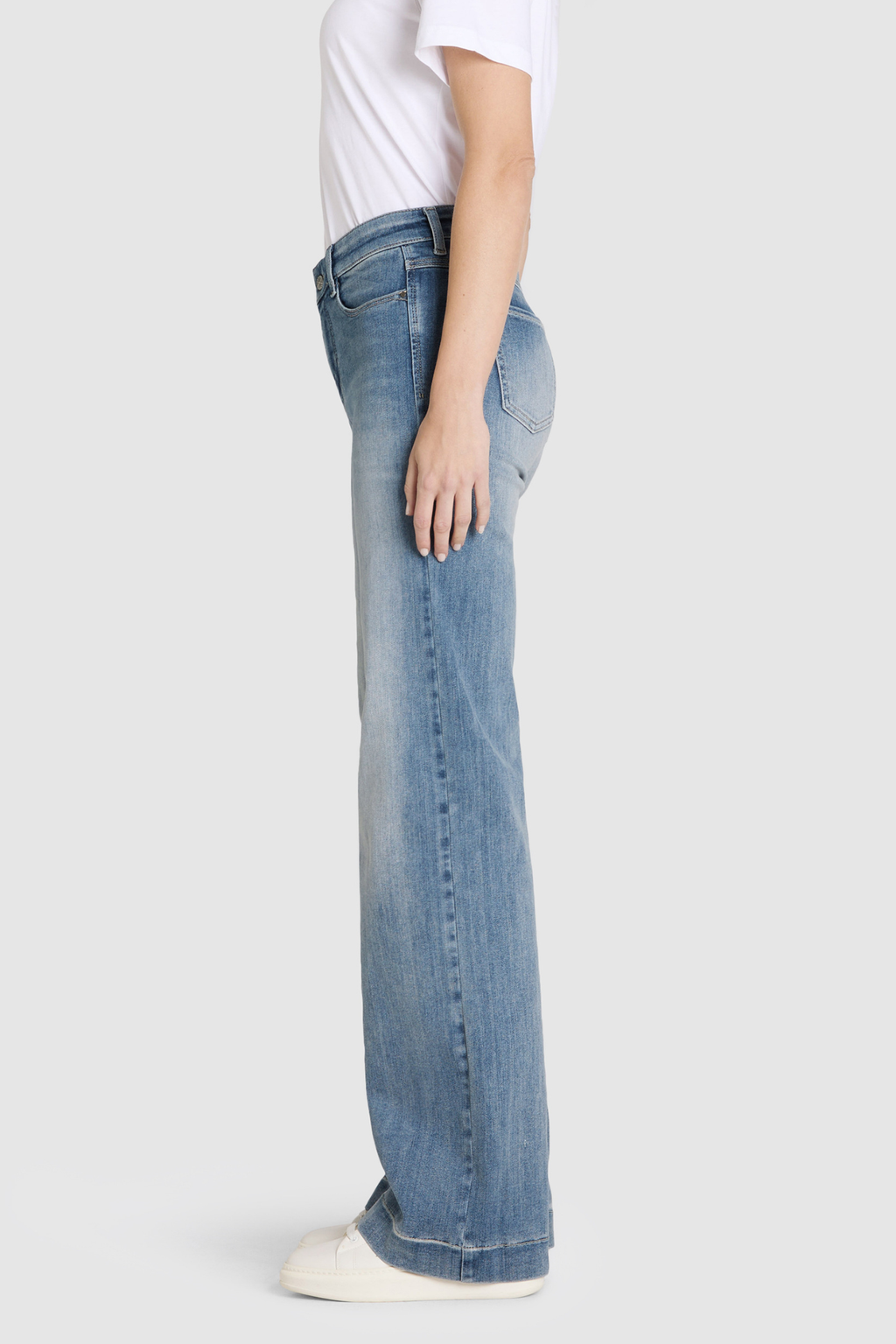 Model wearing MAC Dream Wide Authentic Sky Blue Wash wide leg stretch jeans in a light blue denim wash. Shop MAC Jeans at Dotique.