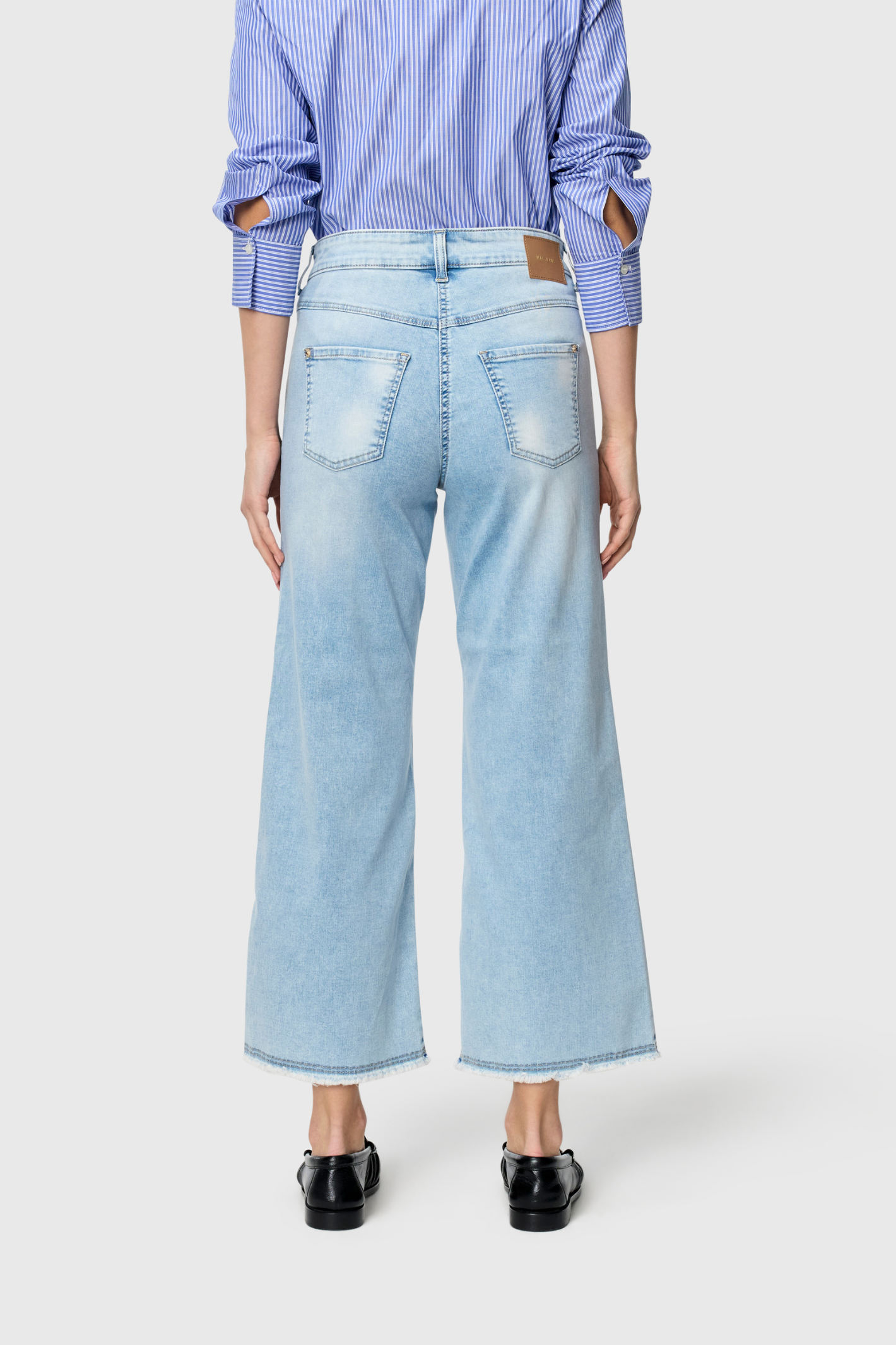 Model wearing MAC Jeans 5438-90-D237 Dream Wide Cropped Light Azure Blue by Mac Jeans Shop Mac Jeans at Dotique