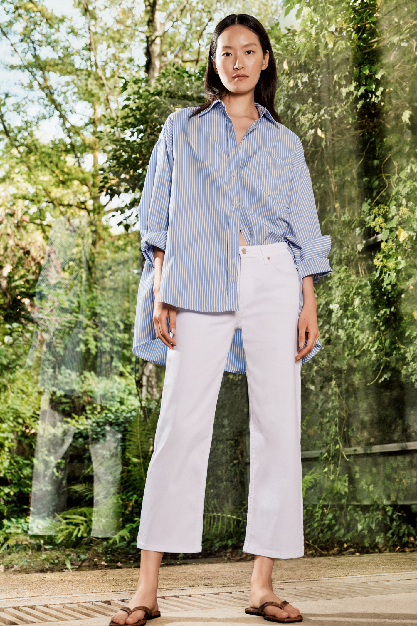 Model wearing MAC Jeans White Denim Culotte 5984-9B-0391L D010 by Mac Jeans, shop Mac Jeans at Dotique