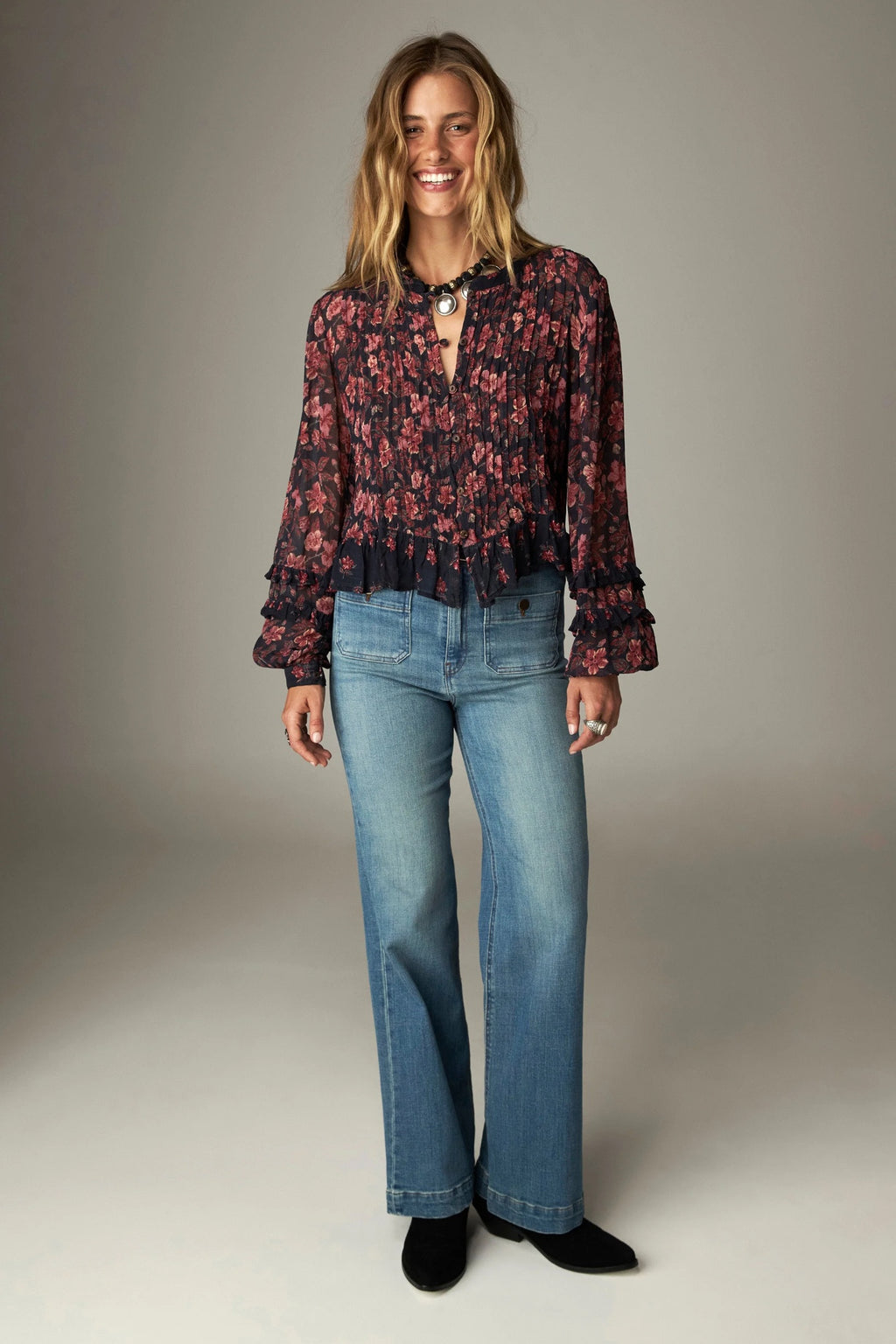 Shop the Maison Hotel Lerele Blouse in Punk Pink at Dotique. A printed cropped blouse with a pleated front, band collar and ruffled hem.