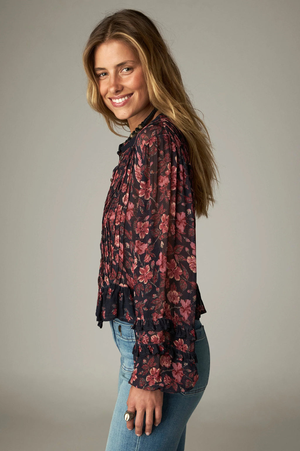 Shop the Maison Hotel Lerele Blouse in Punk Pink at Dotique. A printed cropped blouse with a pleated front, band collar and ruffled hem.