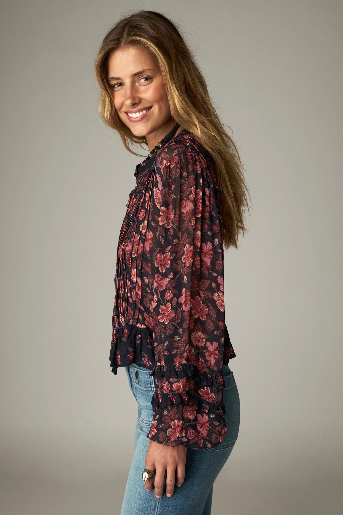 Shop the Maison Hotel Lerele Blouse in Punk Pink at Dotique. A printed cropped blouse with a pleated front, band collar and ruffled hem.