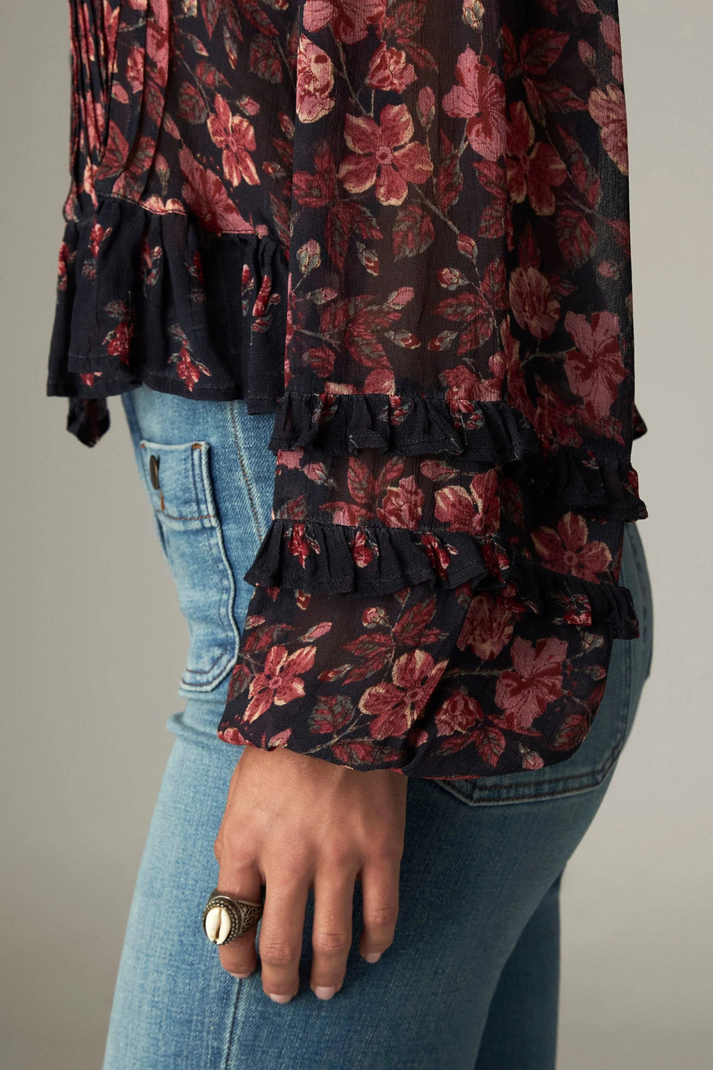 Shop the Maison Hotel Lerele Blouse in Punk Pink at Dotique. A printed cropped blouse with a pleated front, band collar and ruffled hem.