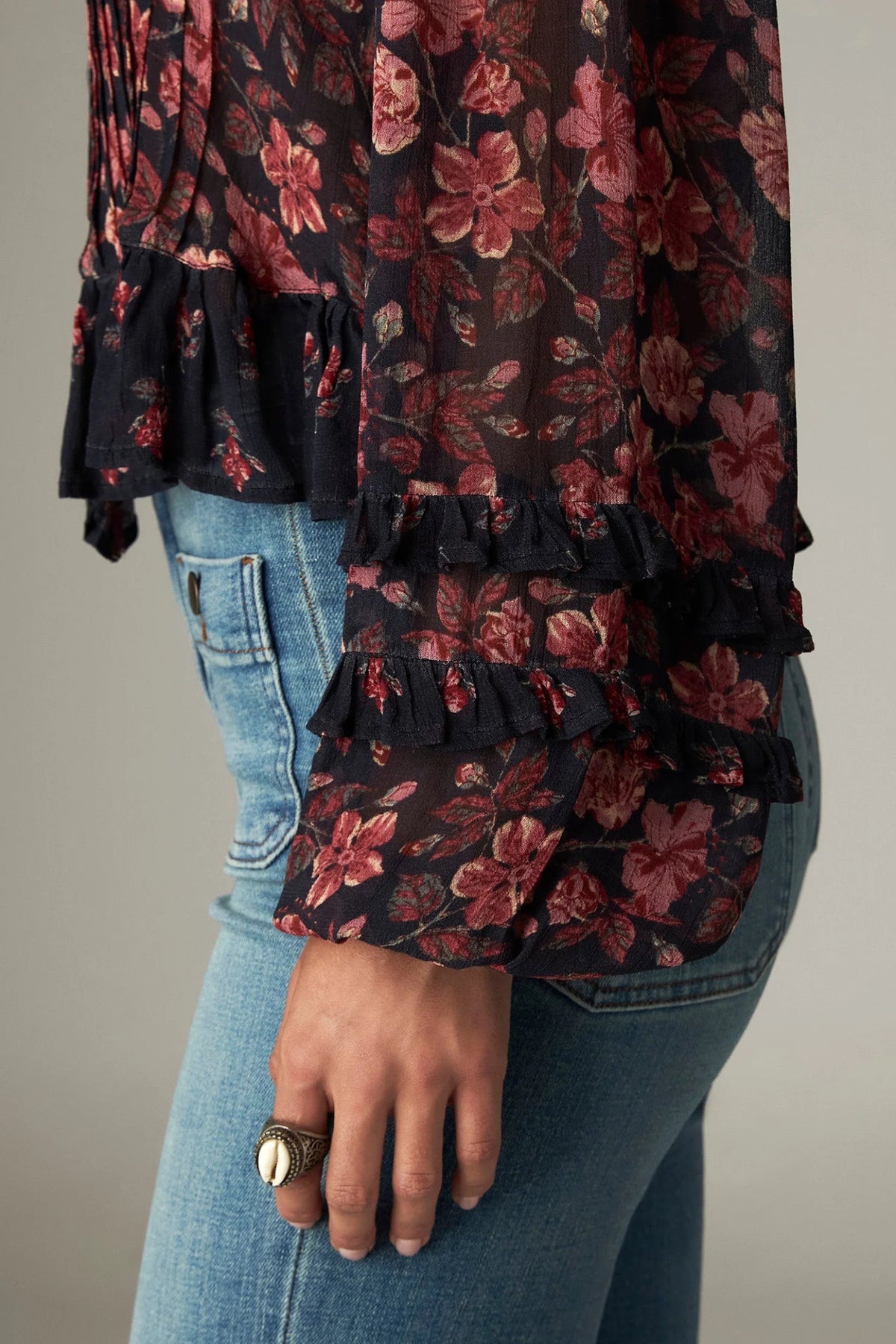 Shop the Maison Hotel Lerele Blouse in Punk Pink at Dotique. A printed cropped blouse with a pleated front, band collar and ruffled hem.