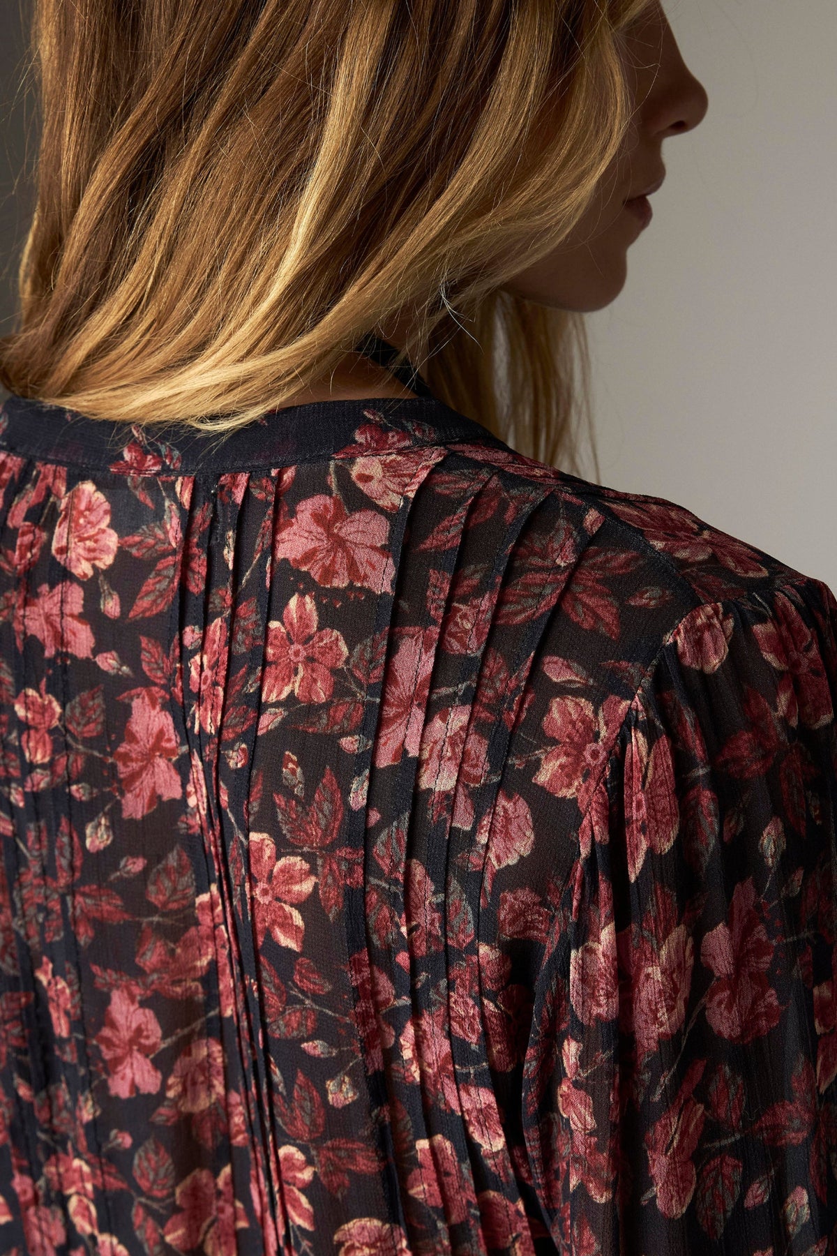 Shop the Maison Hotel Lerele Blouse in Punk Pink at Dotique. A printed cropped blouse with a pleated front, band collar and ruffled hem.