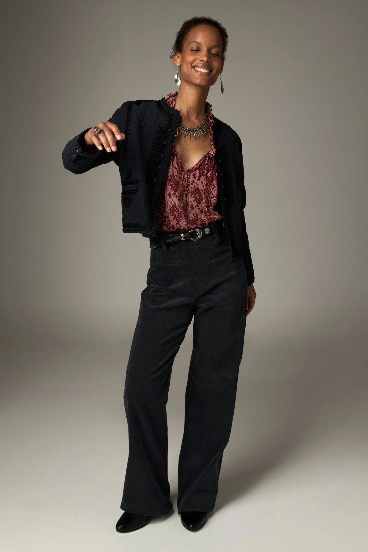 Shop the Maison Hotel Hannah Blouse in Wine at Dotique. A printed blouse with a ruffled neckline, tassel ties and voluminous sleeves.