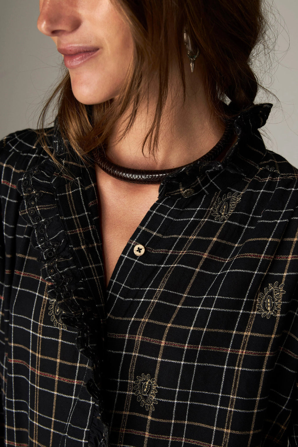 Shop the Maison Hotel Coco Blouse in Noir Plaid at Dotique. A checked cotton blouse with subtle lurex, embroidery and pretty ruffle detailing.