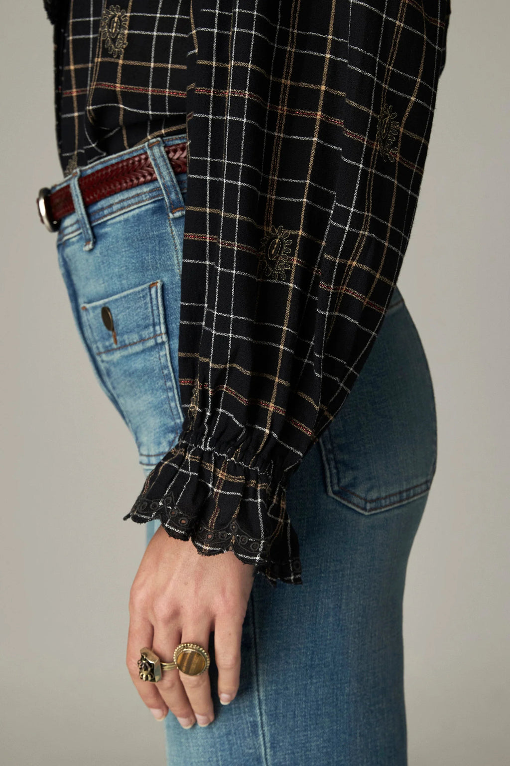 Shop the Maison Hotel Coco Blouse in Noir Plaid at Dotique. A checked cotton blouse with subtle lurex, embroidery and pretty ruffle detailing.