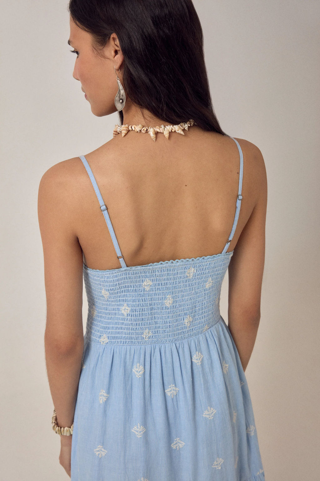 Woman wearing Maison Hotel Etta Sleeveless Dress Sky Blues Sunny by Maison Hotel, shop Maison Hotel at Dotique.