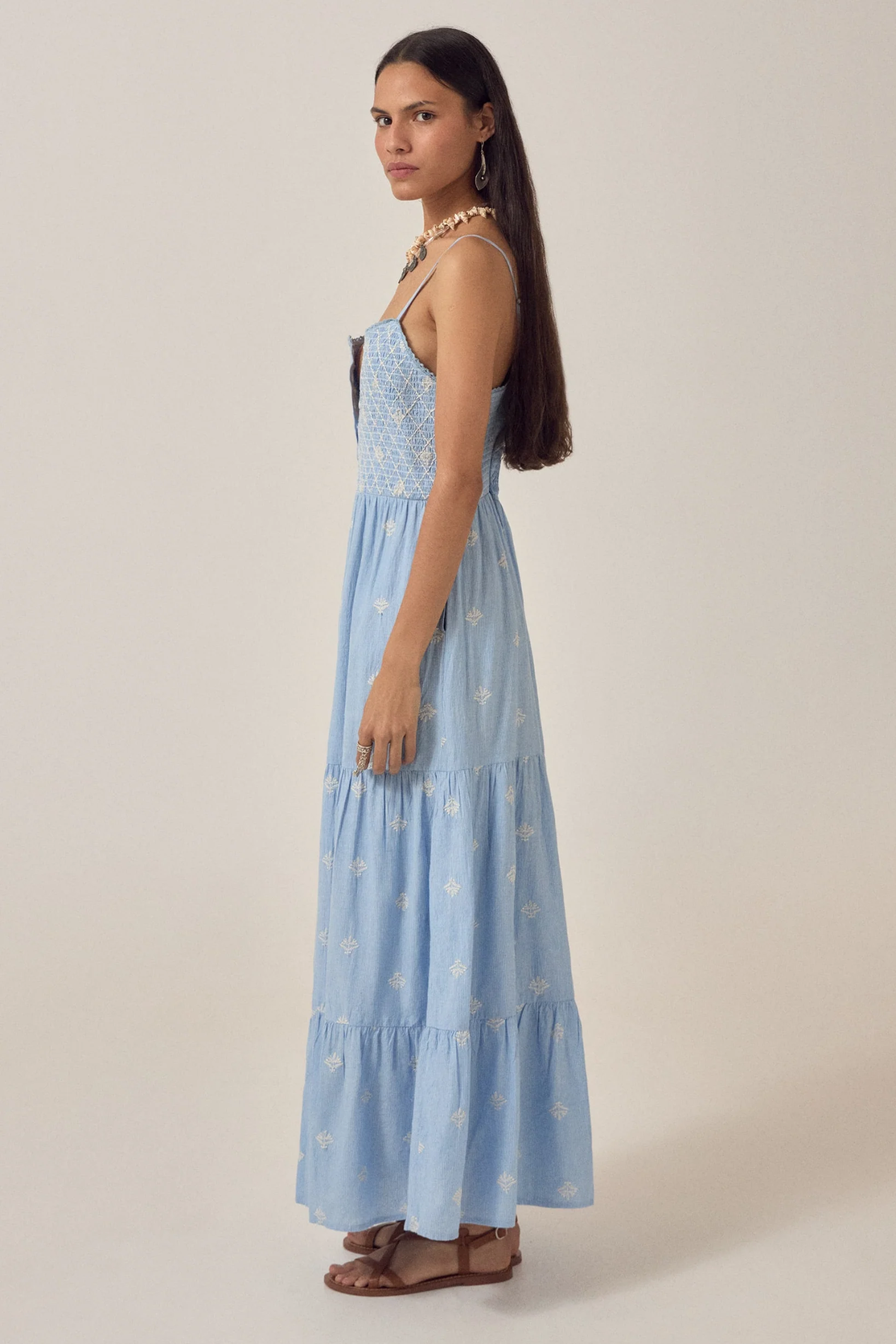 Woman in a light blue Maison Hotel Etta Sleeveless Dress Sky Blues Sunny by Maison Hotel, shop Maison Hotel at Dotique