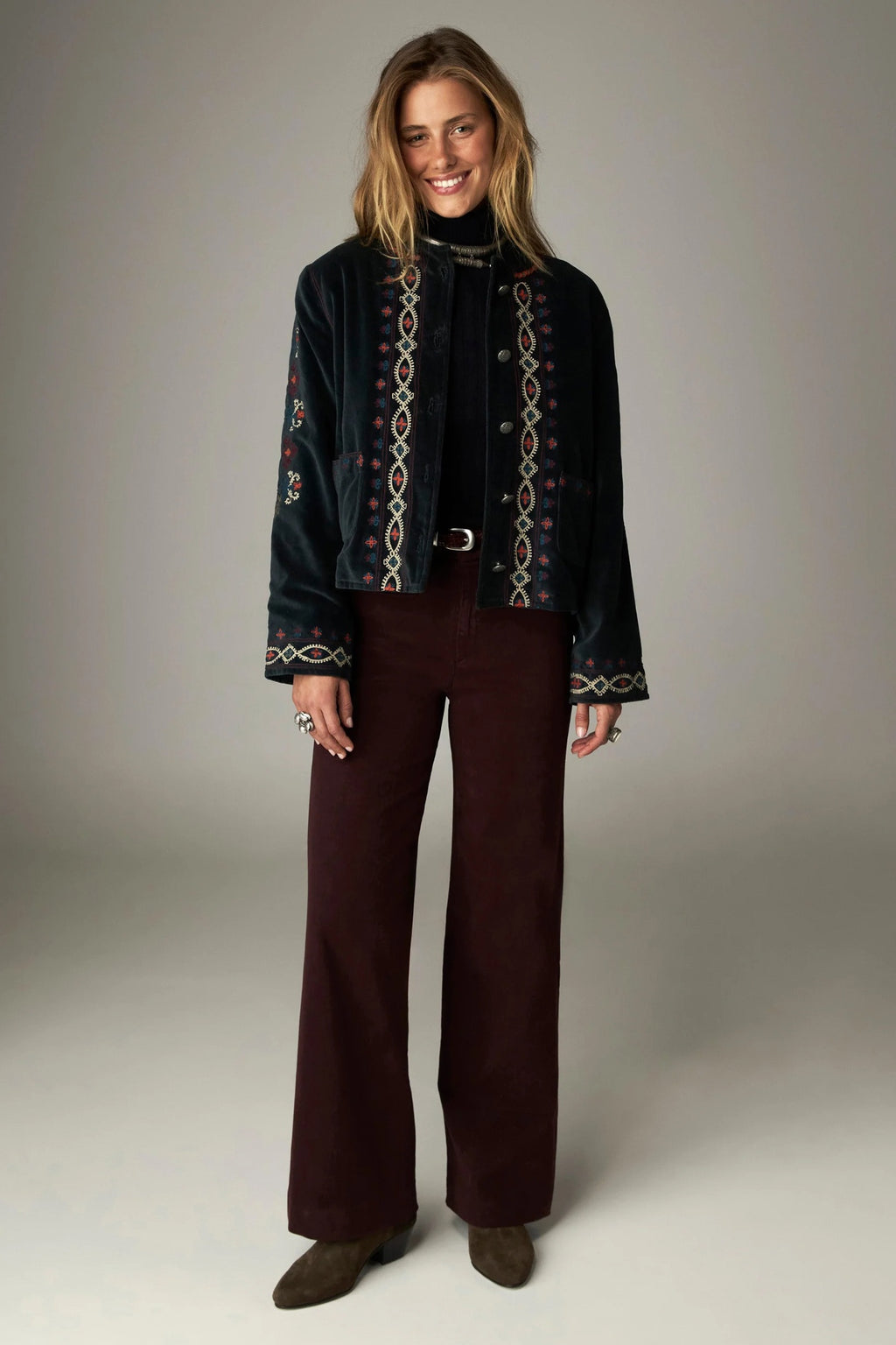 Shop the Maison Hotel Breton Jacket in Jade at Dotique. A cotton velvet jacket with colourful embroidered trims, button front and patch pockets.