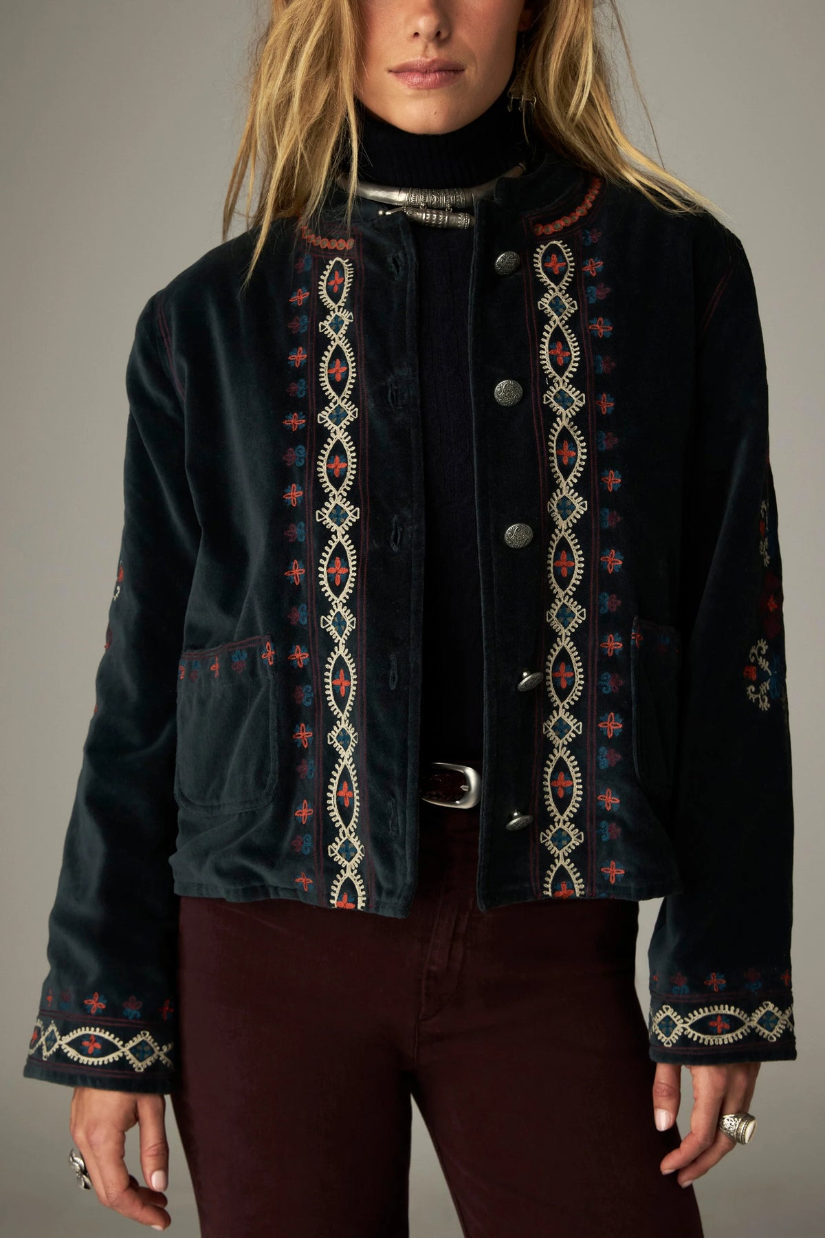 Shop the Maison Hotel Breton Jacket in Jade at Dotique. A cotton velvet jacket with colourful embroidered trims, button front and patch pockets.
