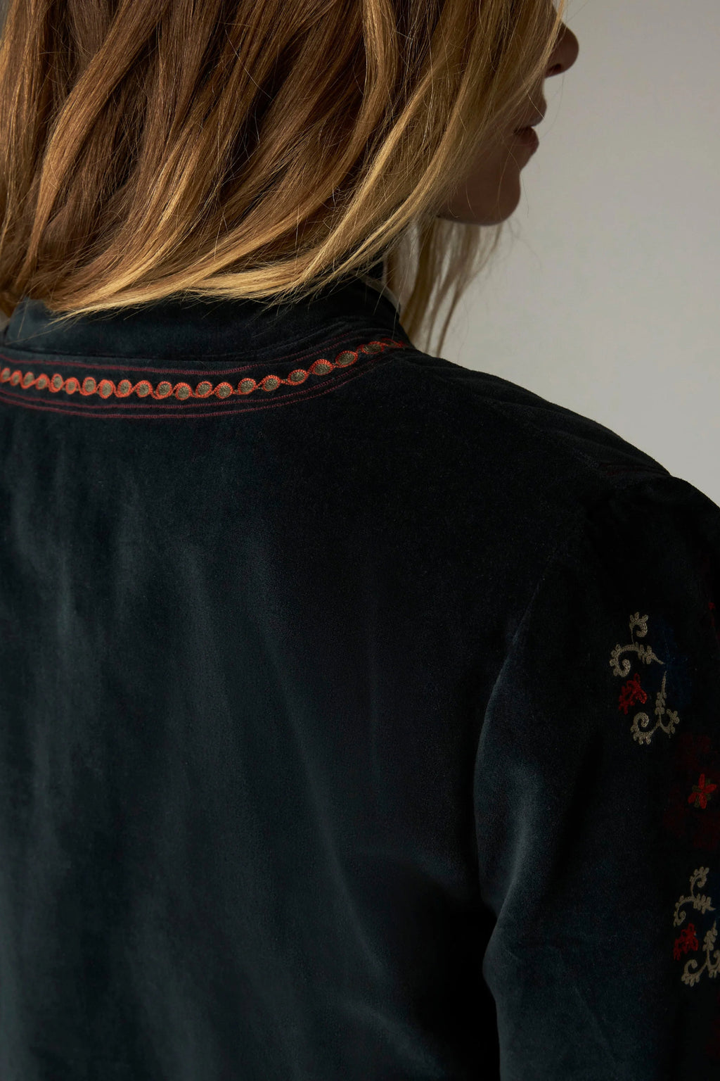 Shop the Maison Hotel Breton Jacket in Jade at Dotique. A cotton velvet jacket with colourful embroidered trims, button front and patch pockets.