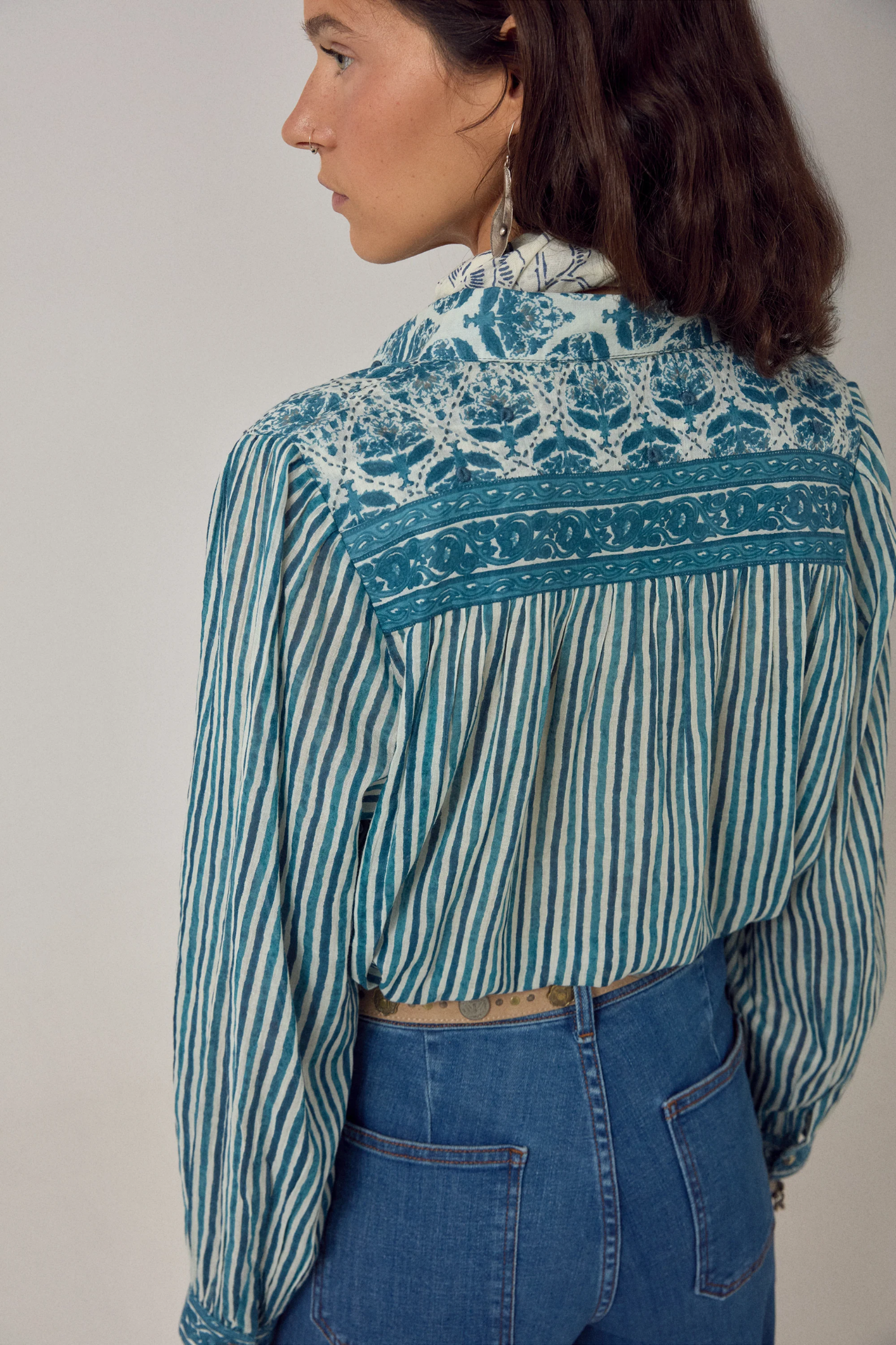 Woman wearing Maison Hotel Maria Shirt - Mediterranean Stripes Blue Ink by Maison Hotel, available to shop at Dotique.