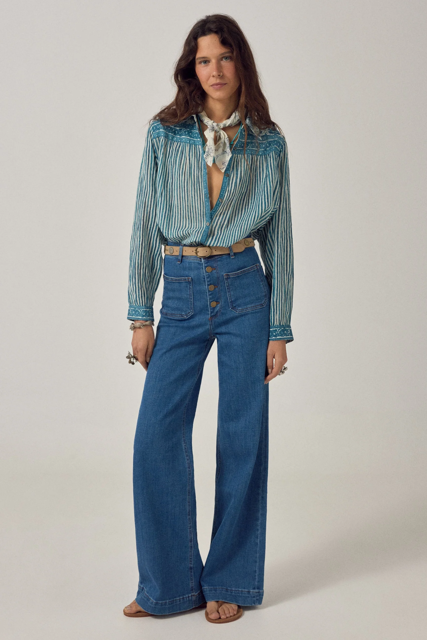 Woman wearing Maison Hotel Maria Shirt - Mediterranean Stripes Blue Ink by Maison Hotel, available to shop at Dotique.