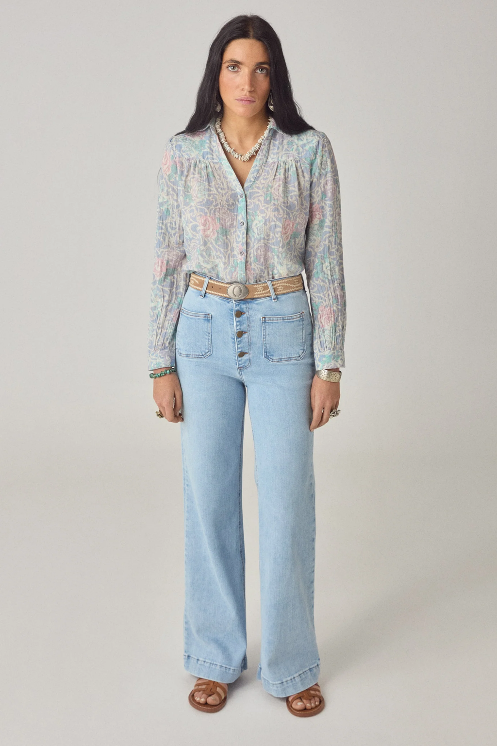 Woman wearing Maison Hotel Rani Shirt Misty Garden with light floral print, styled with jeans, shop Maison Hotel at Dotique