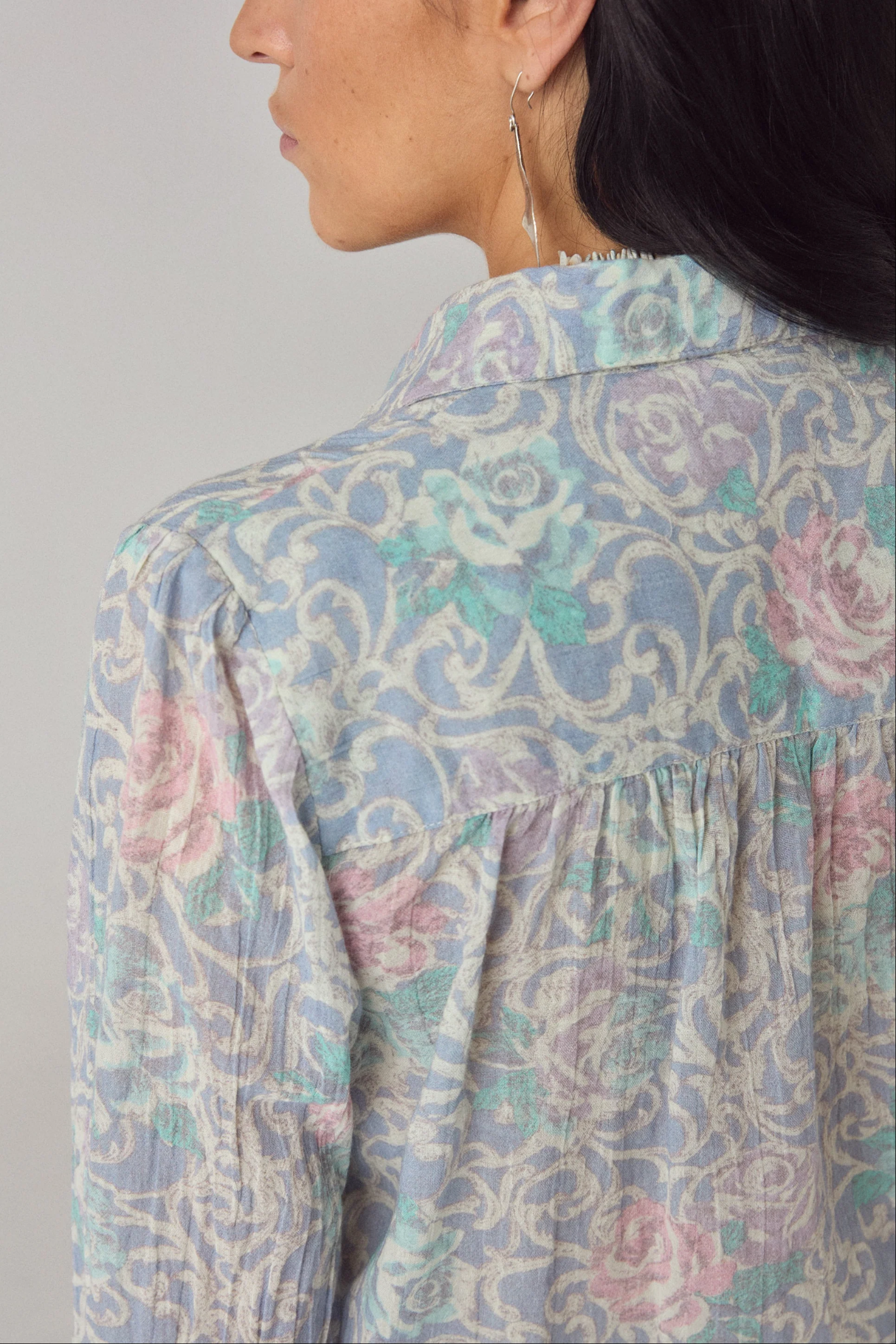Close-up of a model wearing the Maison Hotel Rani Shirt Misty Garden by Maison Hotel, shop Maison Hotel at Dotique