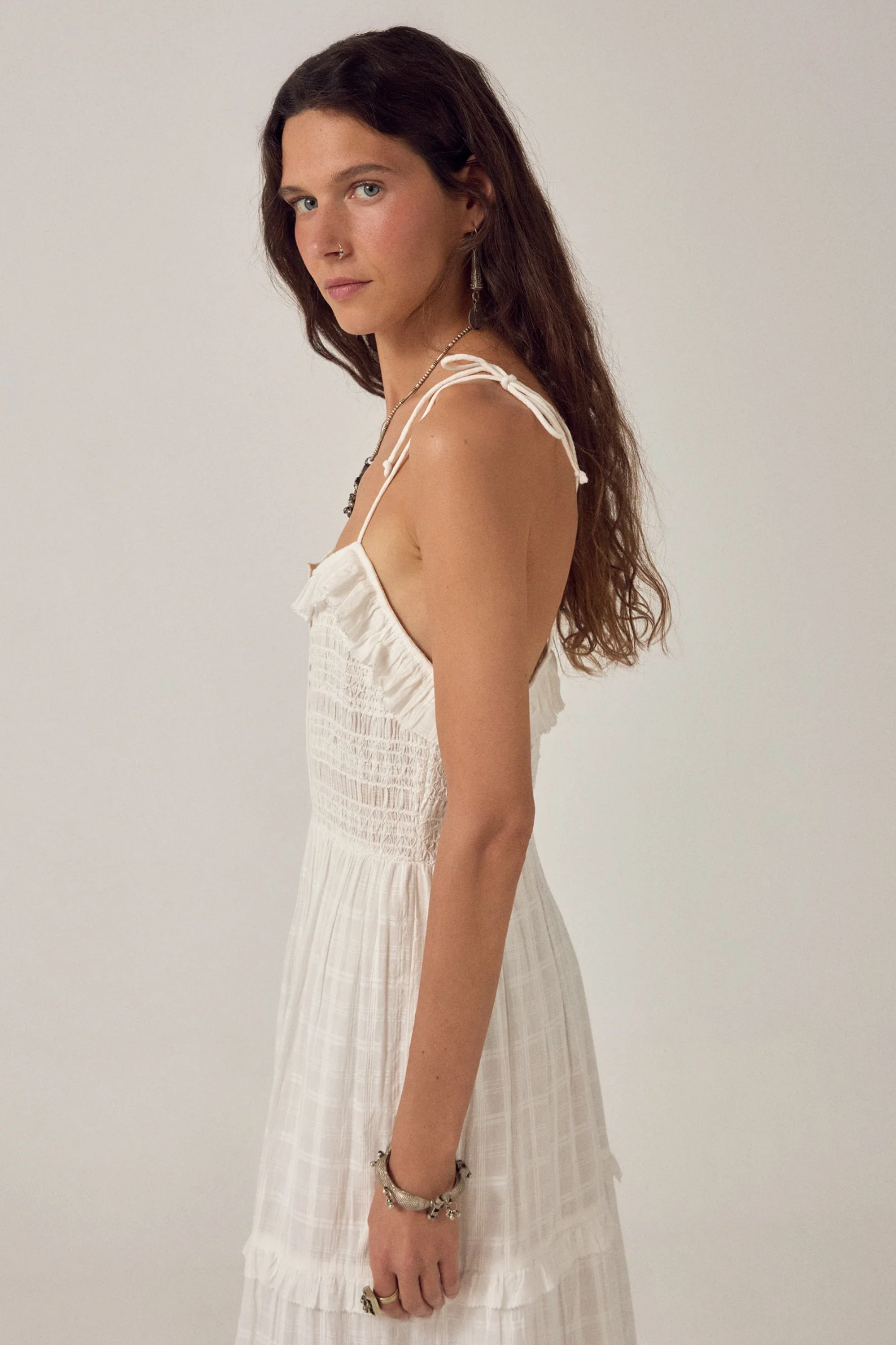 Model in a white Maison Hotel Sienna Dress Love Me Tender Nuage by Maison Hotel, shop Maison Hotel at Dotique.