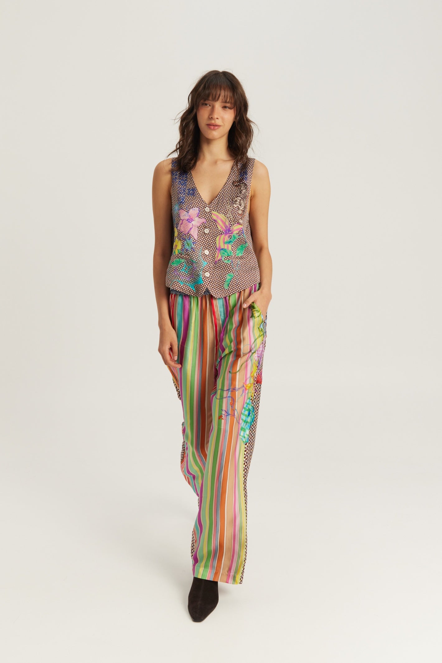 Shop the ME369 Bailey Straight Leg Track Pants in Paradiso at Dotique. Soft viscose blend trousers featuring a vibrant artistic print and relaxed straight-leg fit.
