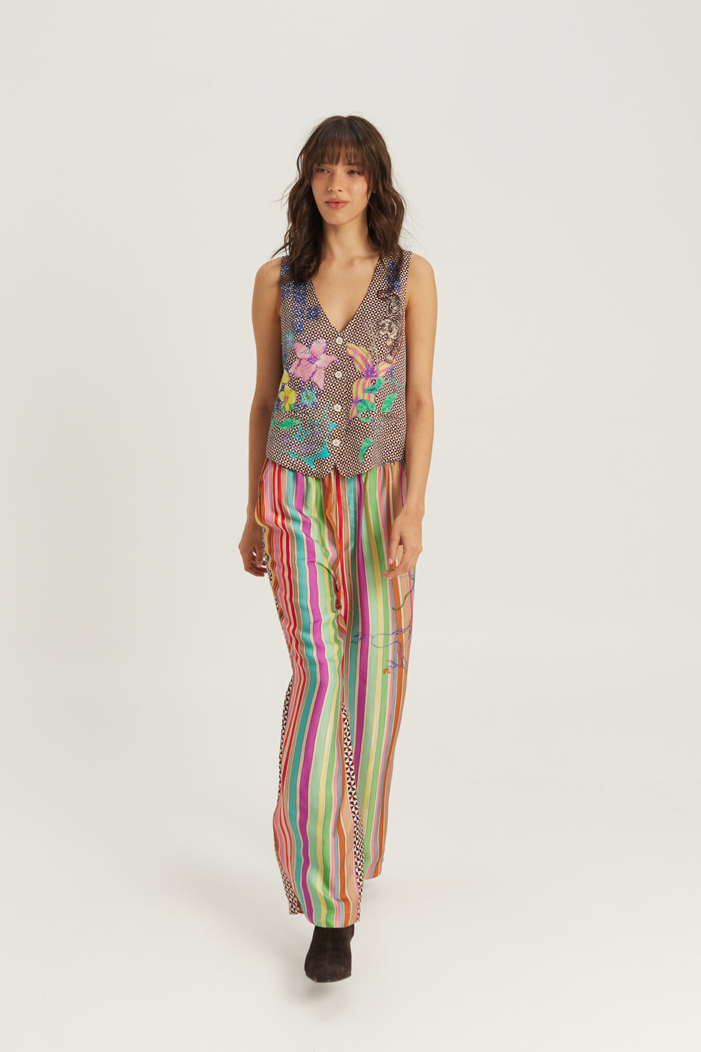 Shop the ME369 Bailey Straight Leg Track Pants in Paradiso at Dotique. Soft viscose blend trousers featuring a vibrant artistic print and relaxed straight-leg fit.