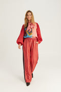 Shop the ME369 Bailey Straight Leg Track Pants in Red Aura at Dotique. Soft viscose blend trousers with a relaxed straight-leg fit and signature statement detailing.