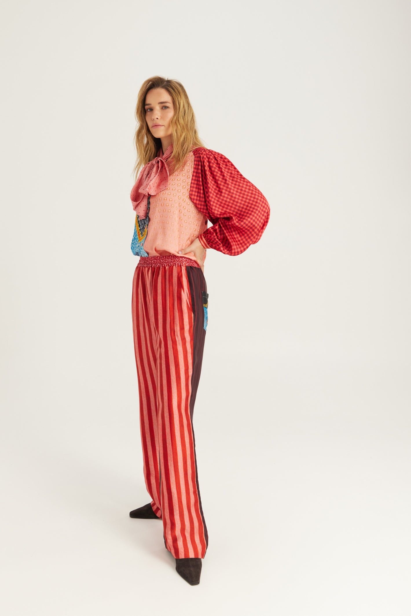 Shop the ME369 Bailey Straight Leg Track Pants in Red Aura at Dotique. Soft viscose blend trousers with a relaxed straight-leg fit and signature statement detailing.