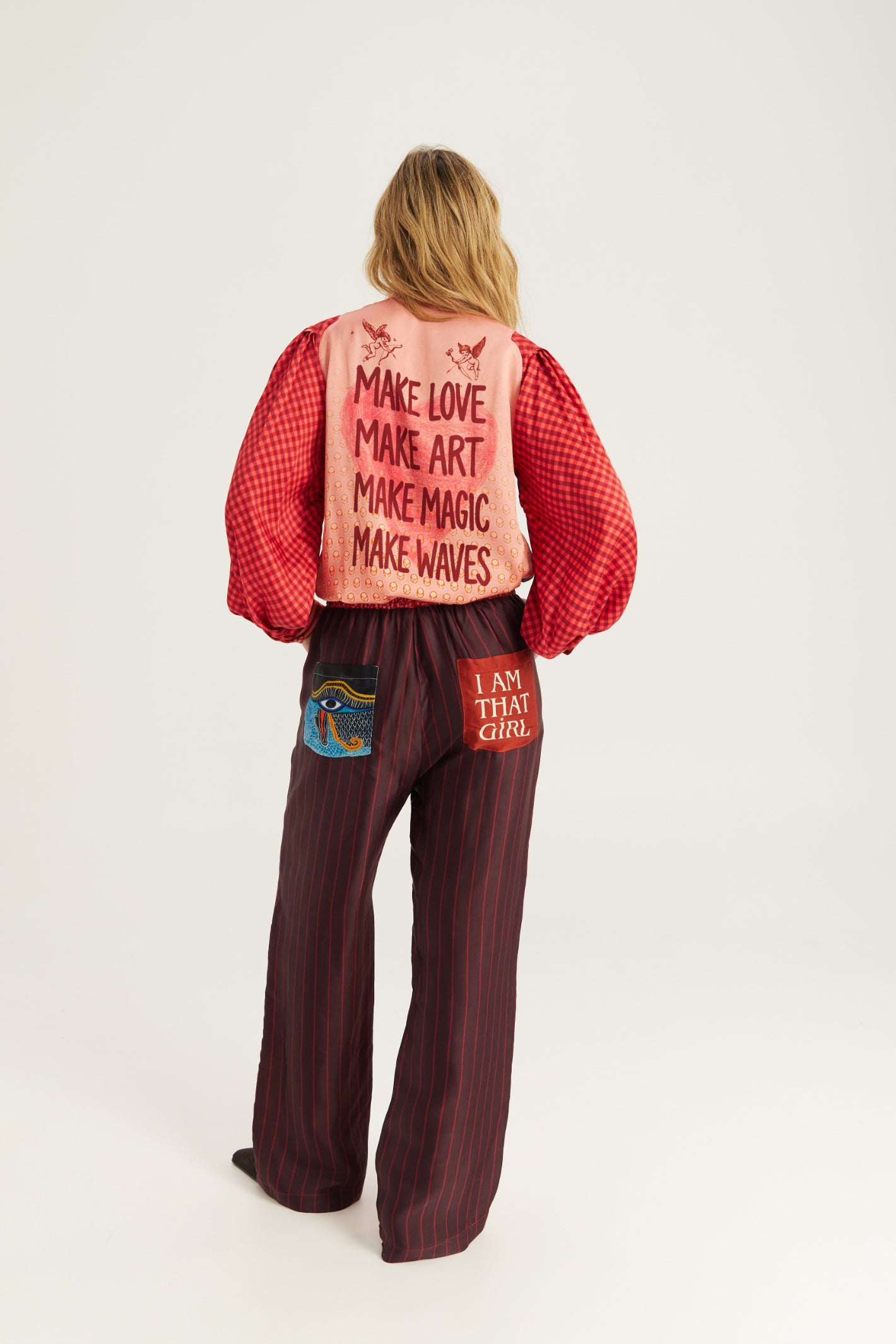 Shop the ME369 Bailey Straight Leg Track Pants in Red Aura at Dotique. Soft viscose blend trousers with a relaxed straight-leg fit and signature statement detailing.