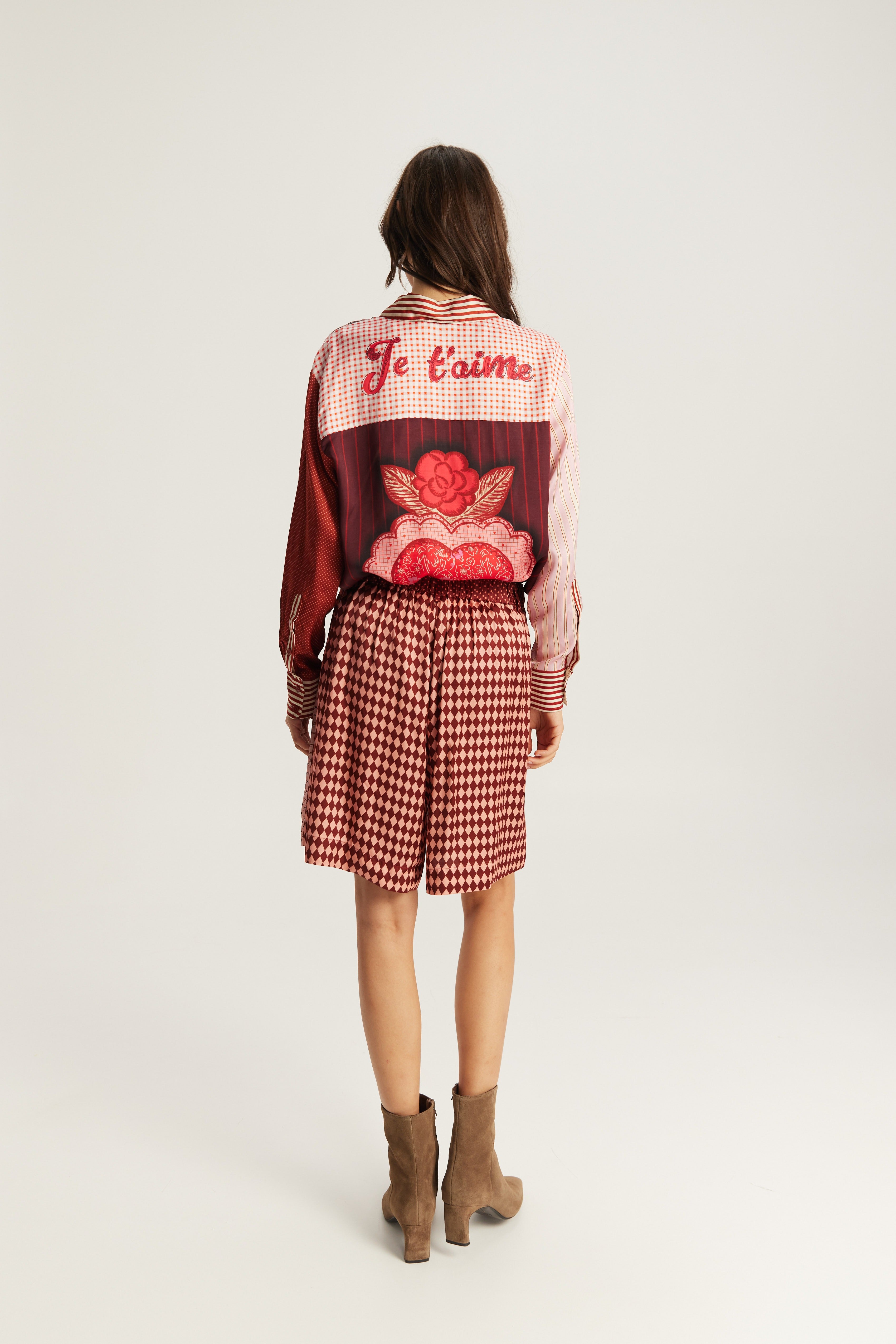 Shop the ME369 Isabel Printed Shirt in Red Aura at Dotique. A relaxed printed shirt crafted from a soft viscose blend with signature ME369 patchwork detailing.
