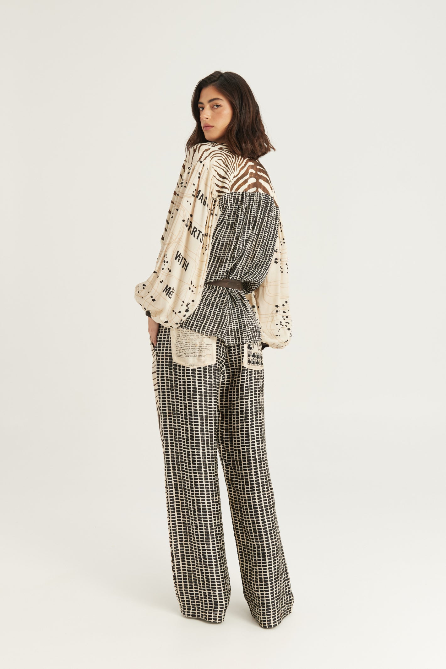 Shop the ME369 Rona Painter's Shirt in Noir Muse at Dotique. A relaxed printed shirt with a waist tie, patch pockets and a soft viscose blend.