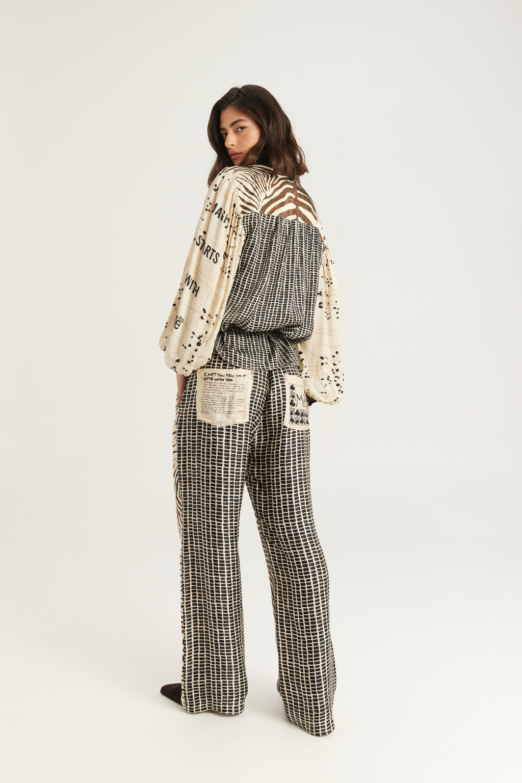 Shop the ME369 Rona Painter's Shirt in Noir Muse at Dotique. A relaxed printed shirt with a waist tie, patch pockets and a soft viscose blend.