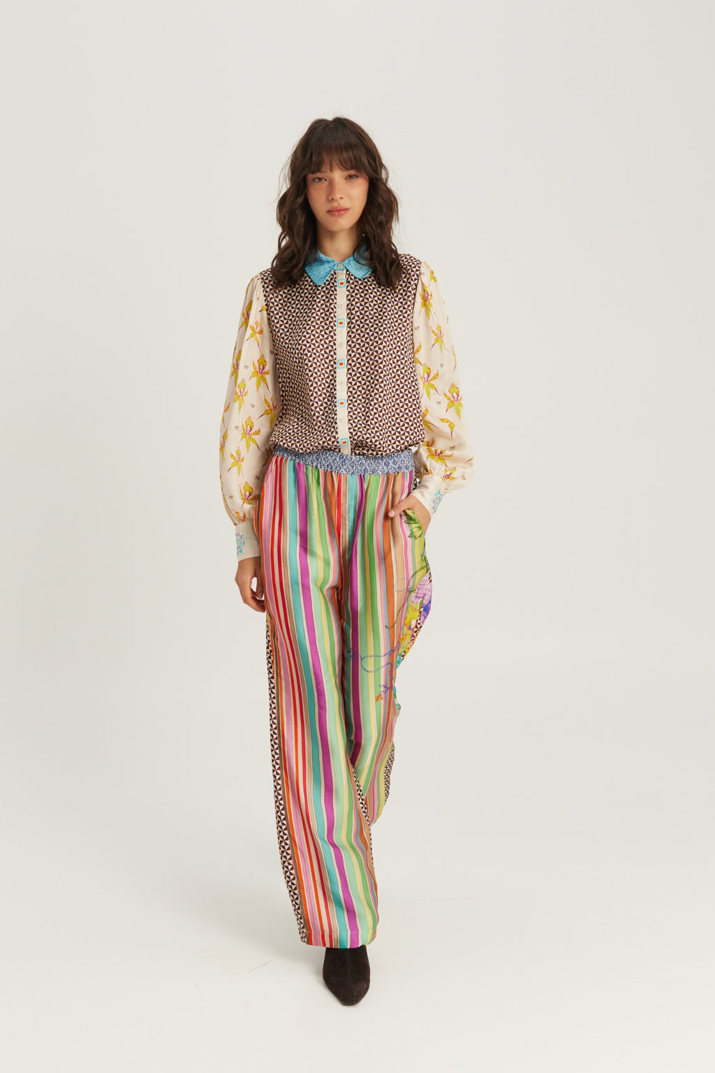 Shop the ME369 Sola Printed Puff Sleeve Blouse in Paradiso at Dotique. A soft printed blouse with puff sleeves, colourful artwork and signature ME369 styling.