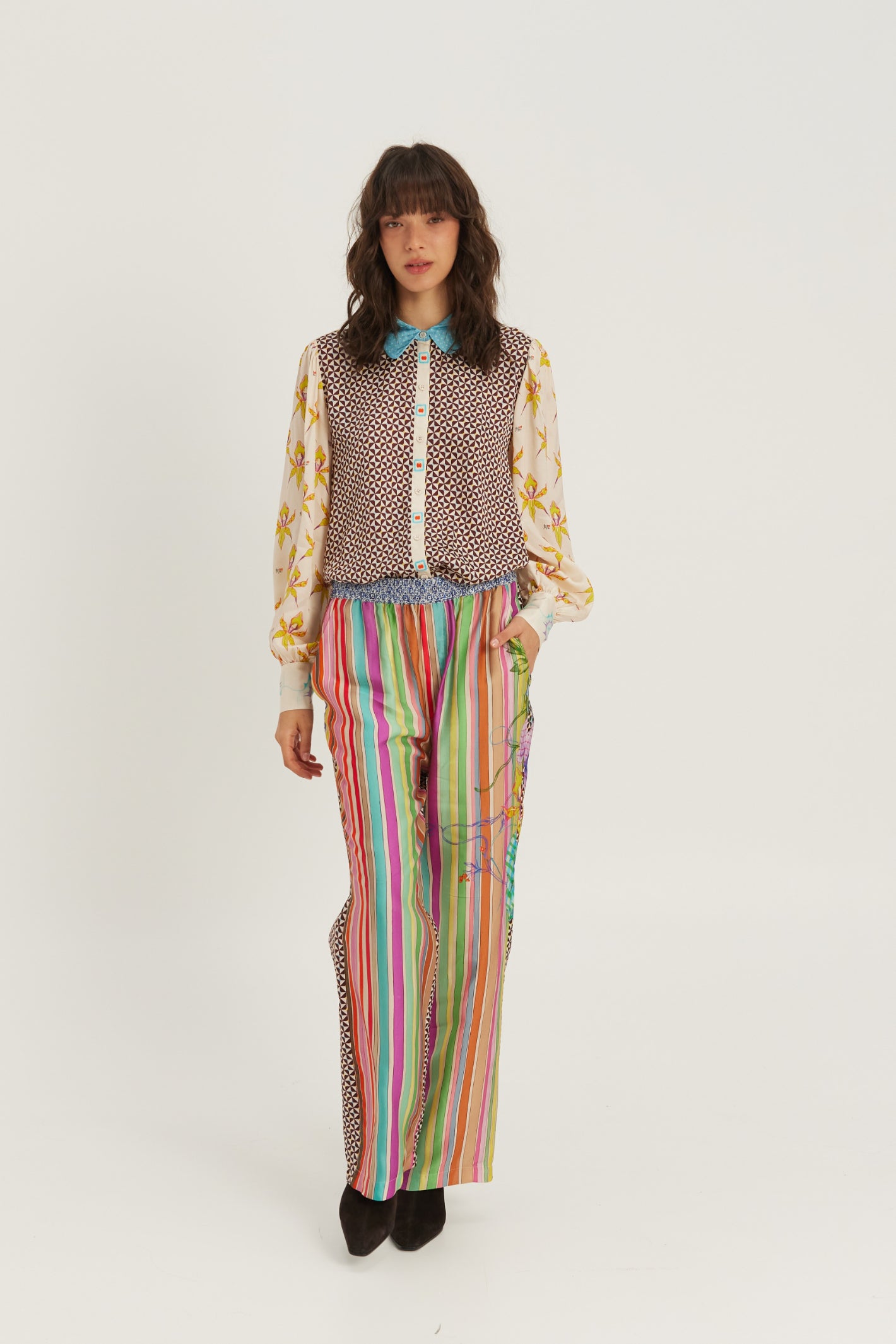 Shop the ME369 Sola Printed Puff Sleeve Blouse in Paradiso at Dotique. A soft printed blouse with puff sleeves, colourful artwork and signature ME369 styling.