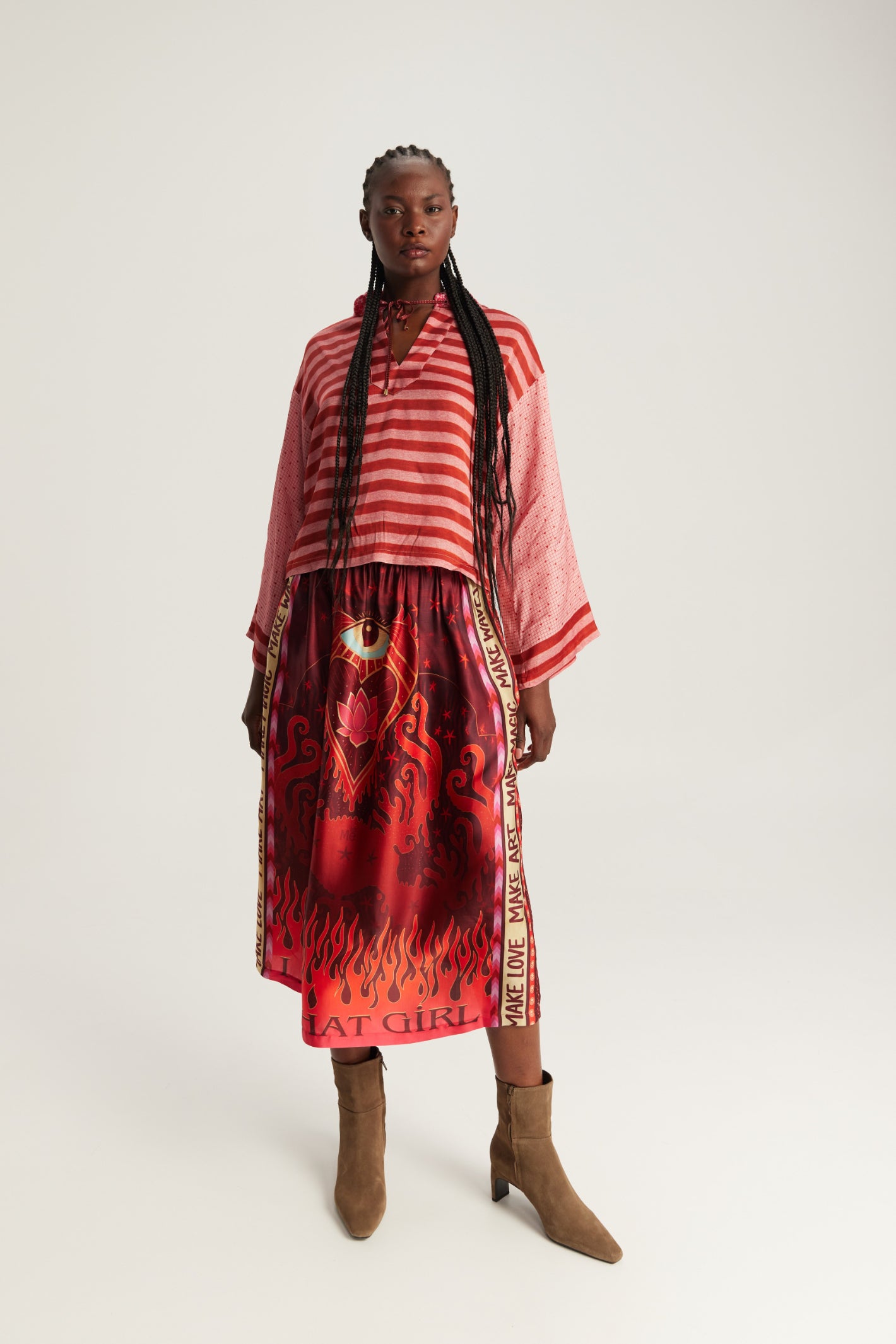Shop the ME369 Vanessa Midi Skirt in Red Aura at Dotique. A flowing printed midi skirt in a soft viscose blend with signature ME369 artwork and effortless movement.