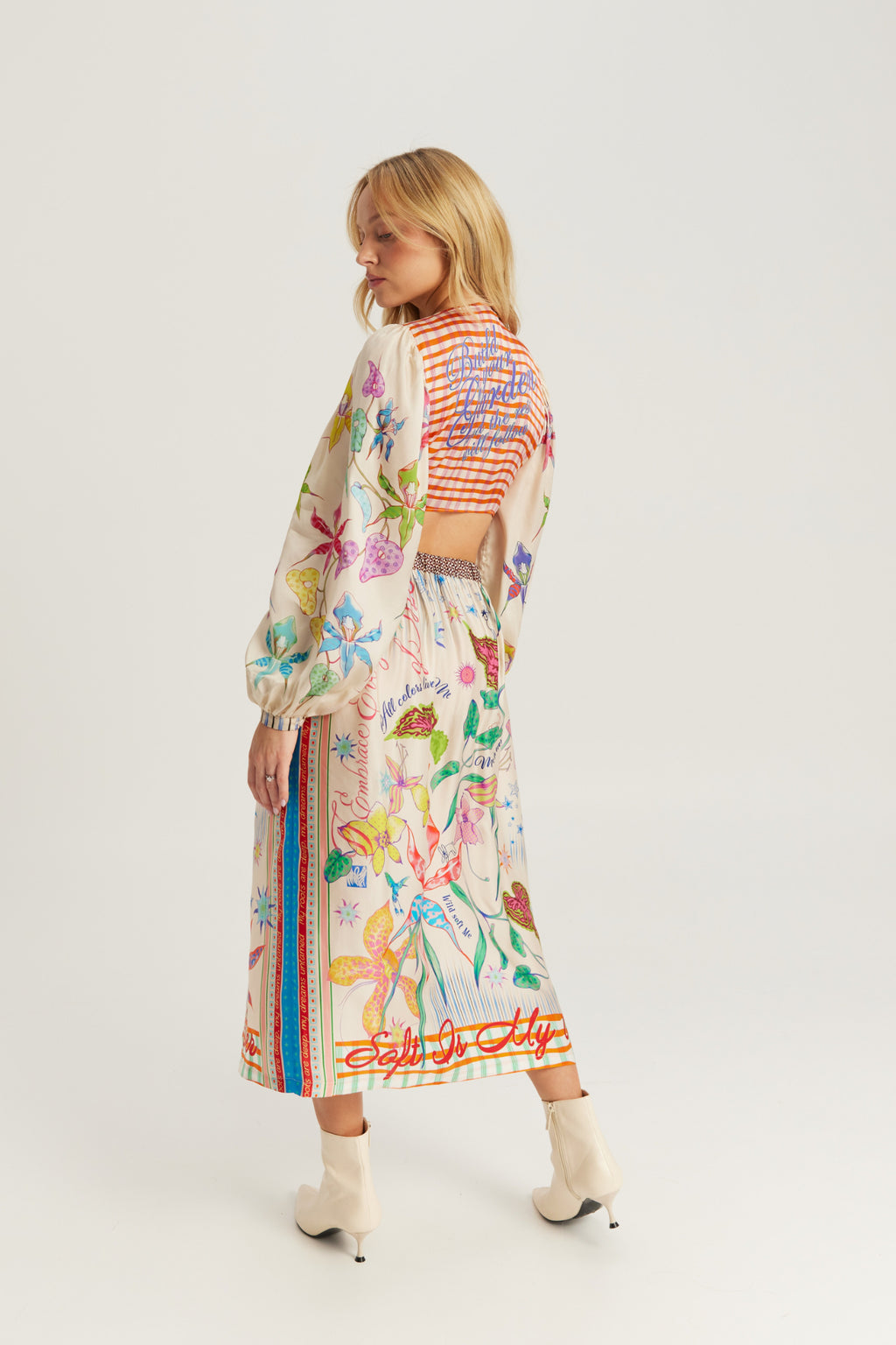 Shop the ME369 Vanessa Midi Skirt in Paradiso at Dotique. A flowing printed midi skirt in a soft viscose blend with colourful artwork and effortless movement.