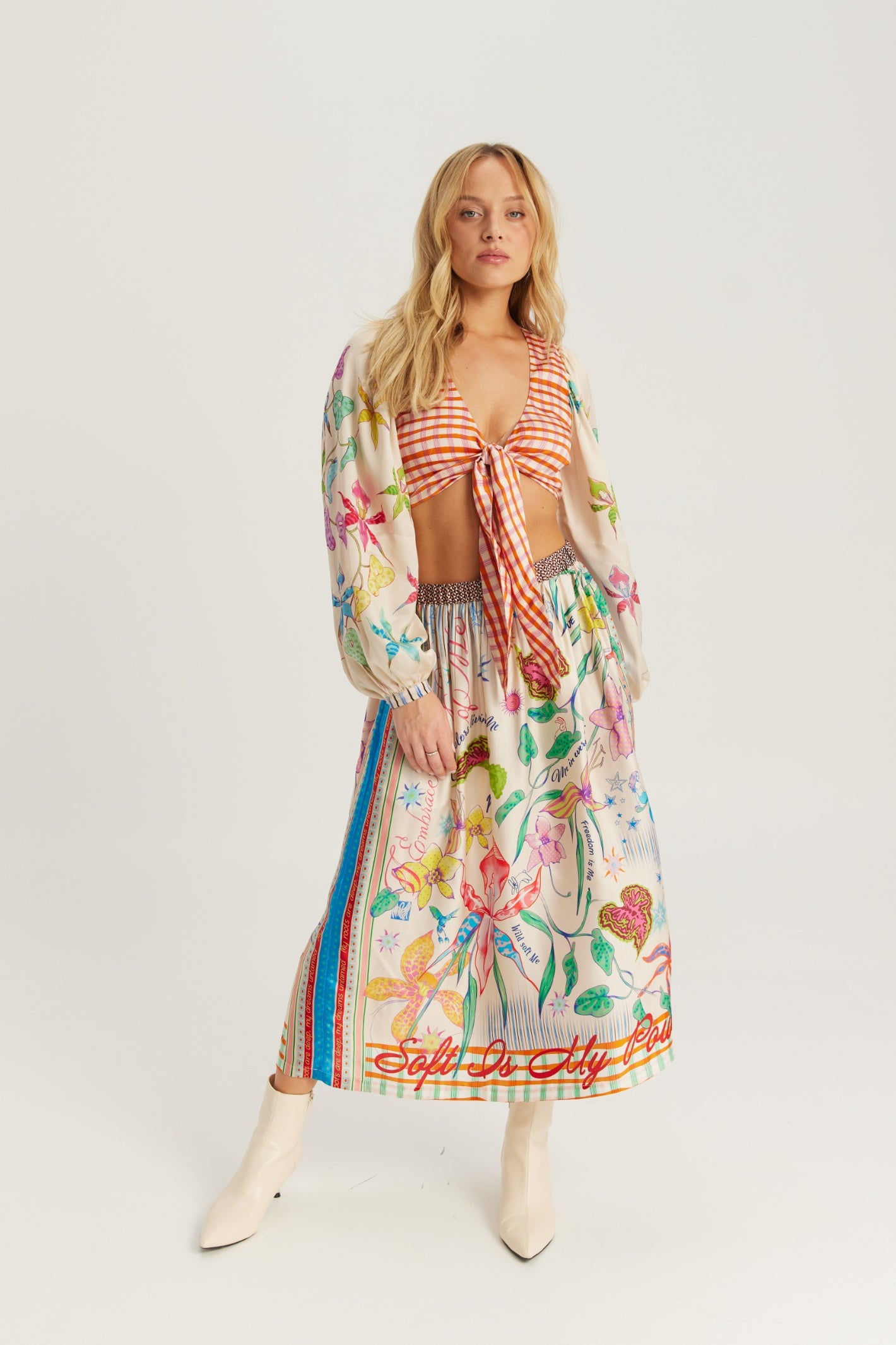Shop the ME369 Vanessa Midi Skirt in Paradiso at Dotique. A flowing printed midi skirt in a soft viscose blend with colourful artwork and effortless movement.