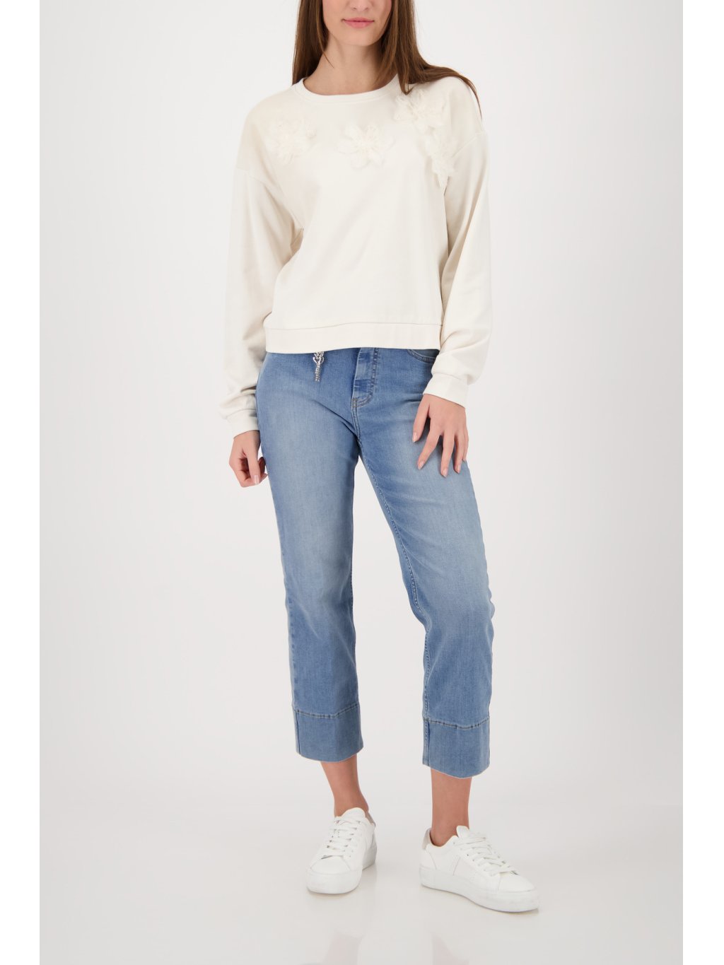 Model wearing Monari 410427 Champagne Beige floral appliqué cotton sweatshirt at Dotique