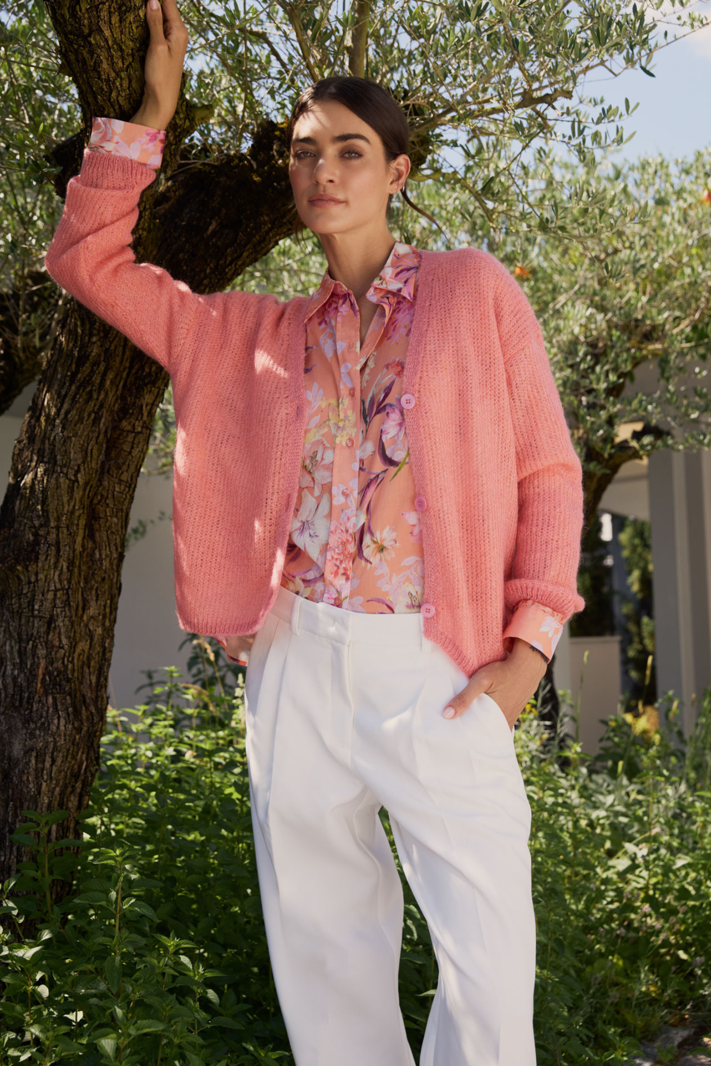 A relaxed Milano shirt blouse with an oversized fit and soft peach print. Designed with long sleeves and a lightweight cotton fabric, it’s an easy piece for everyday wear.