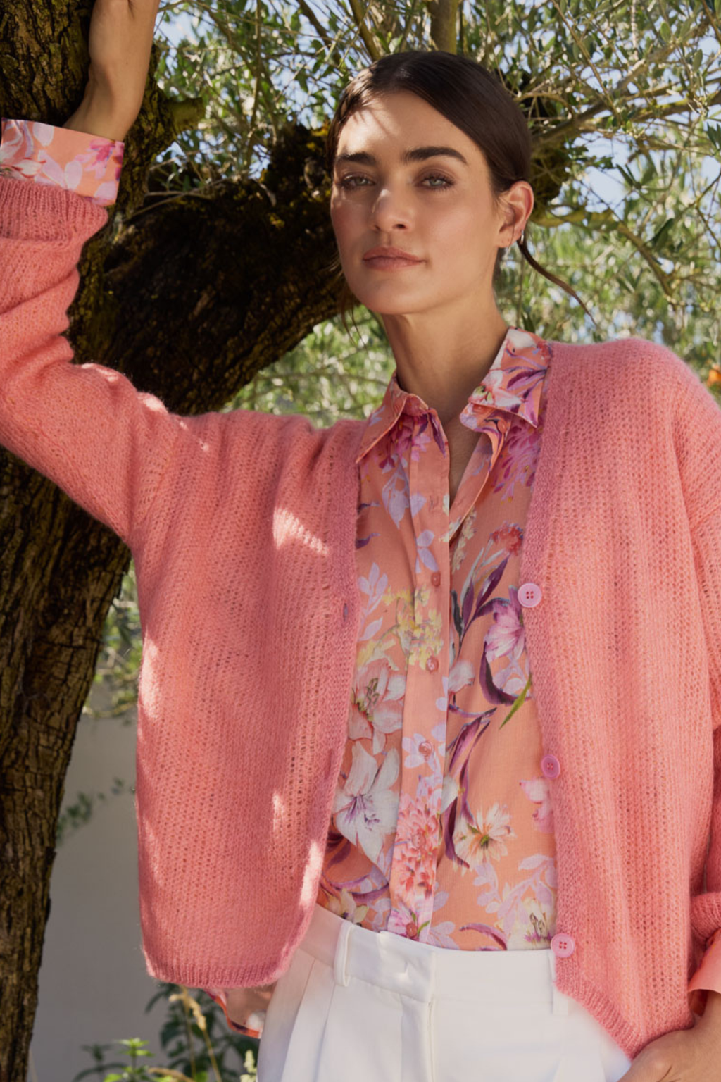 A relaxed Milano shirt blouse with an oversized fit and soft peach print. Designed with long sleeves and a lightweight cotton fabric, it’s an easy piece for everyday wear.