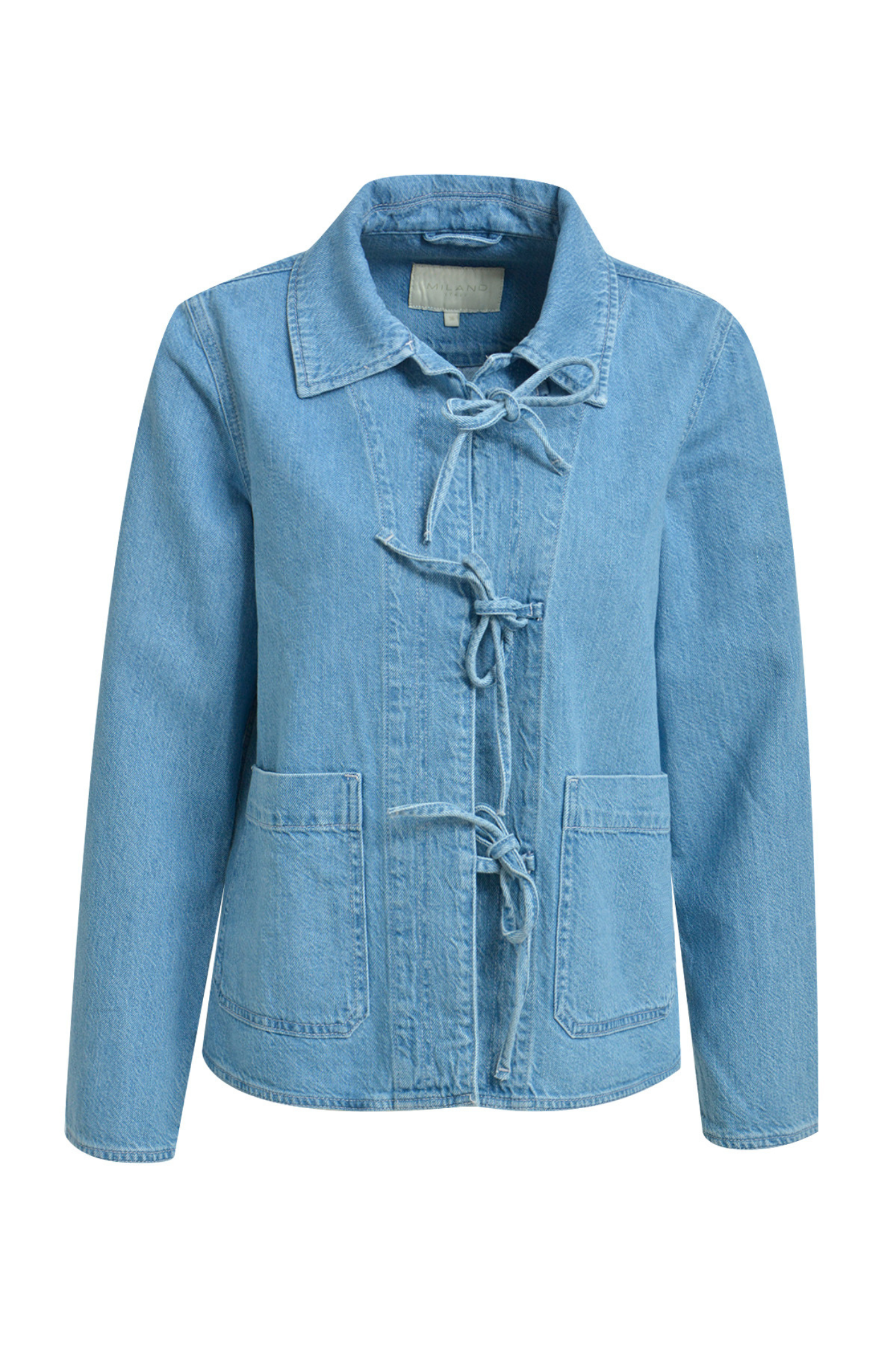 This Milano jacket is a versatile layering piece with a classic collar, button-through front and practical patch pockets. Shop Milano at Dotique.